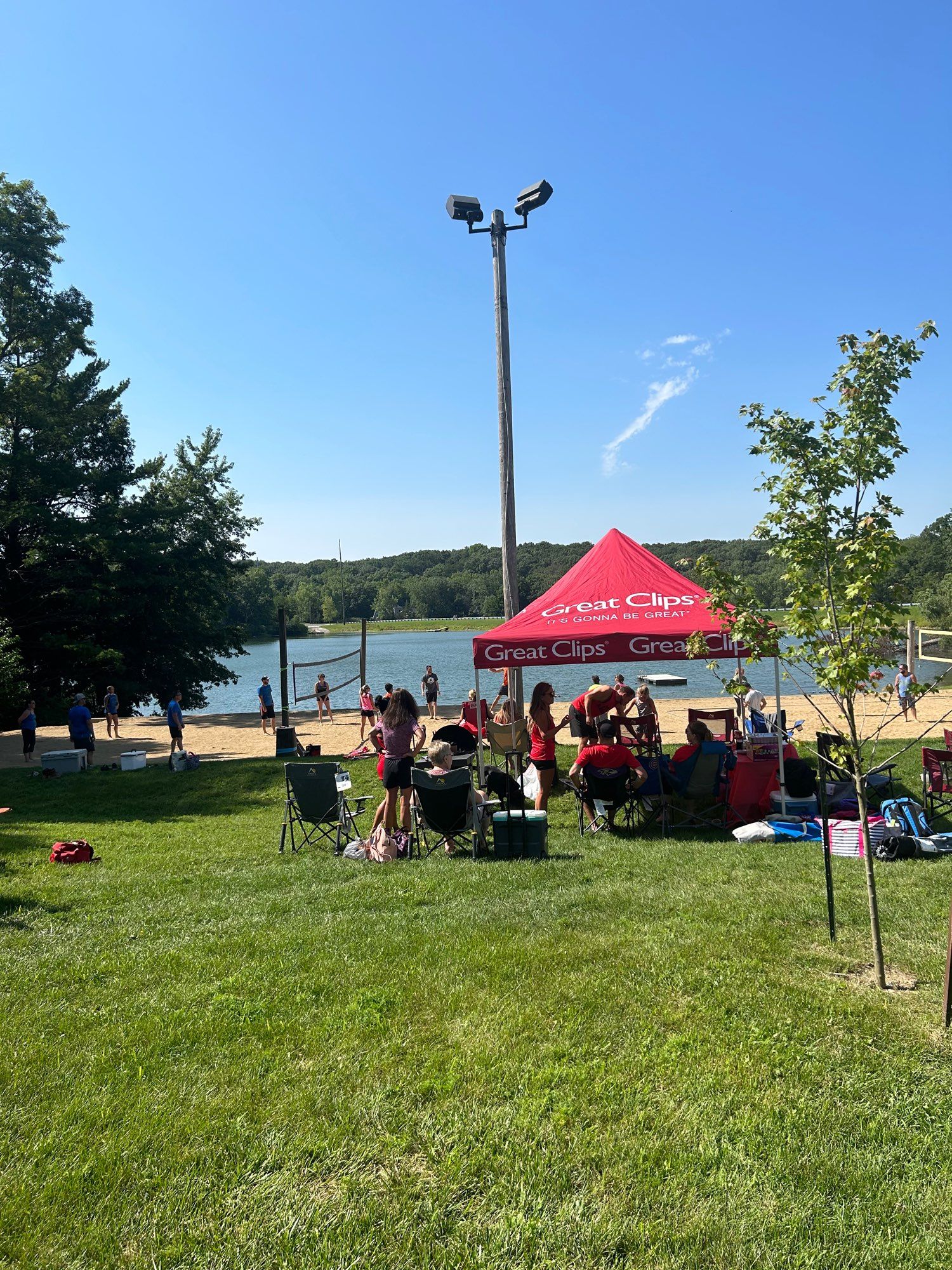 a beautiful sand volleyball court on a lake beach