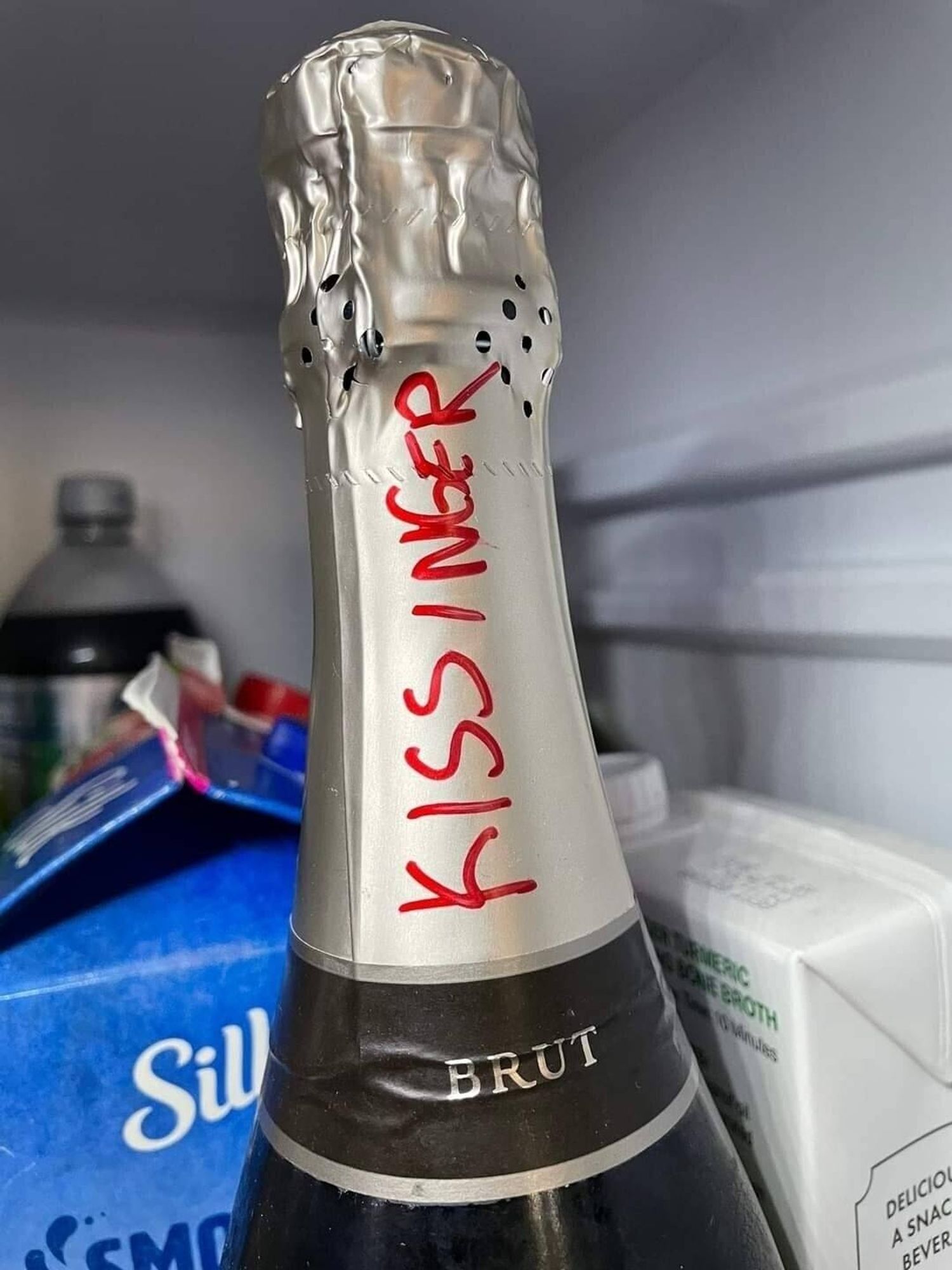 Bottle of brut with Kissinger's name on it