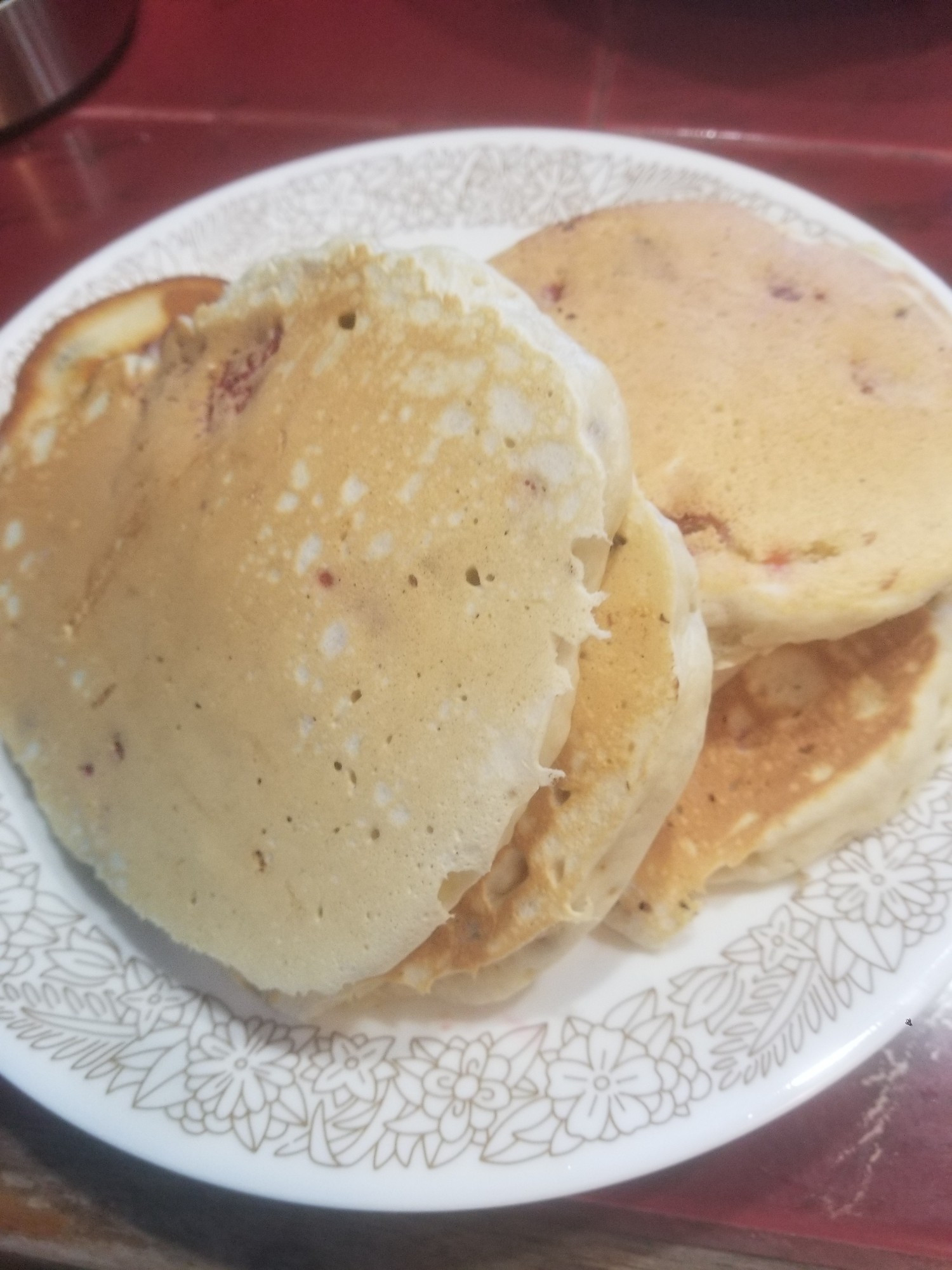 Plate of fluffy raspberry chocolate chip pancakes