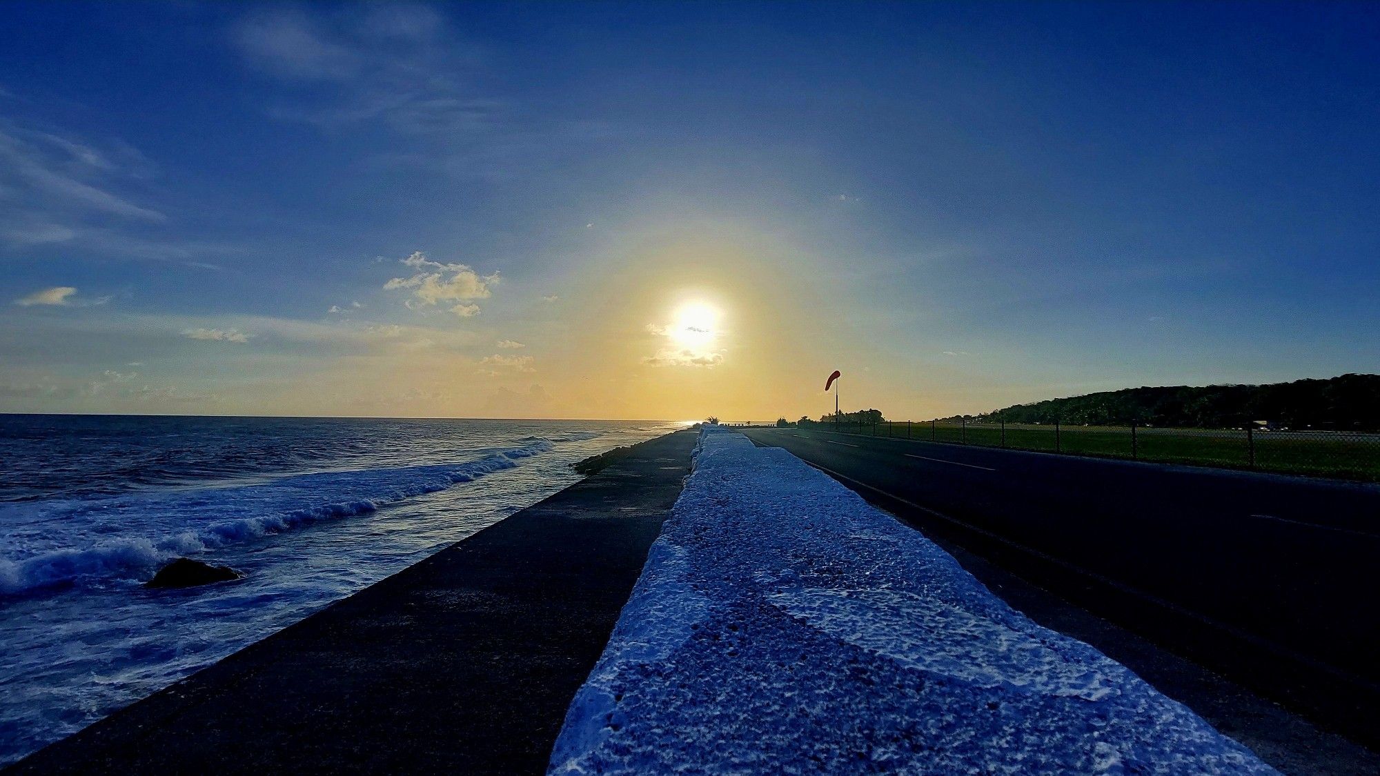 Sunsetting over airport windsock