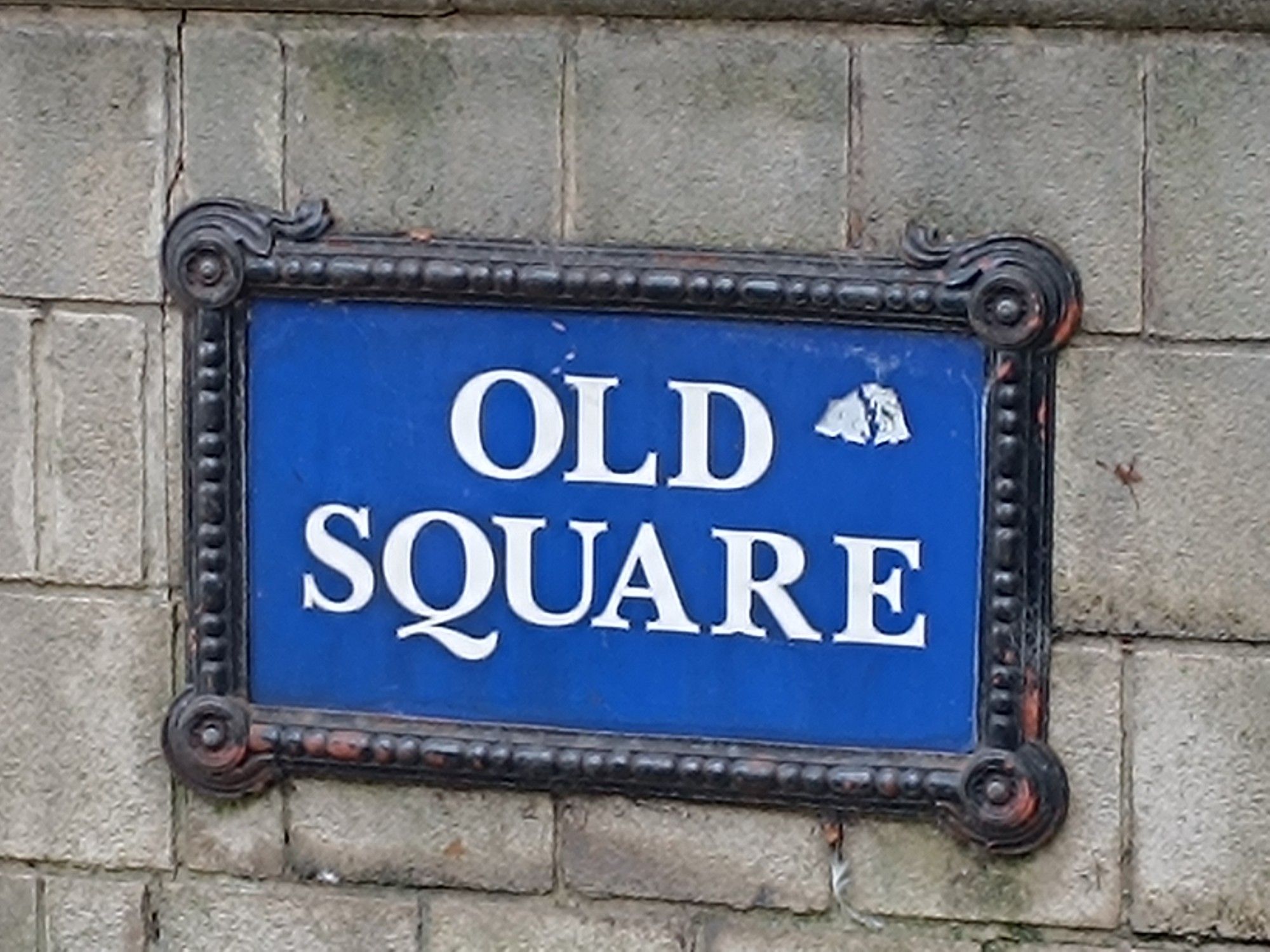 Street sign that says Old Square