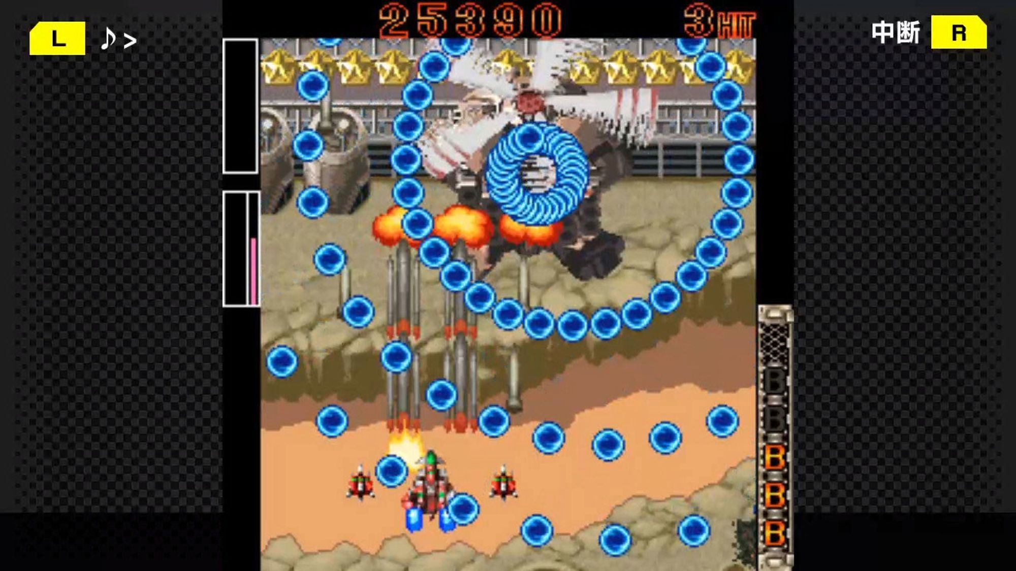 A screenshot of the 2021 bullet hell shmup video game G-MODE DoDonPachi DaiOuJou DX, featuring a spread of blue bullets from a large enemy helicopter, as the small red player ship fires back while dodging bullets. This game is a Steam port of the 2005 Japanese mobile phone release G-MODE DoDonPachi DaiOuJou, which itself is a port of the notoriously difficult, intense 2002 arcade release DoDonPachi DaiOuJou.