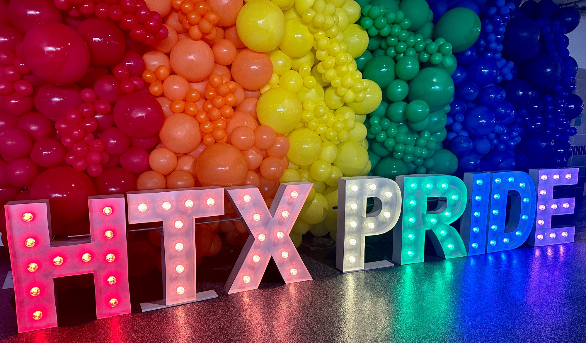 Pregame happy hour rainbow balloons & HTX PRIDE