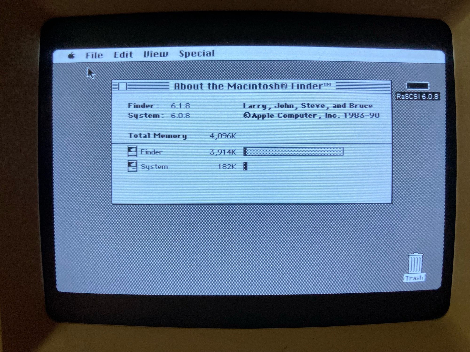 a photo of the B&W screen of a Macintosh SE running system 6.0.8, with the 'About the Macintosh Finder' window open.