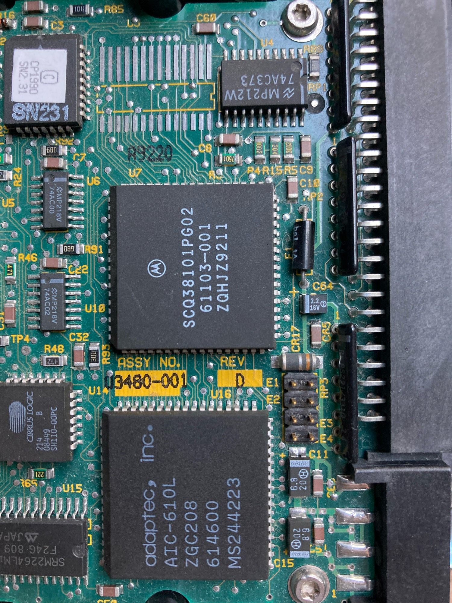 a photo of the circuit board in the bottom of a Connor-made 40SC hard srive. C65 and C64 are to the right, near the bus terminating resistors and SCSI connector.