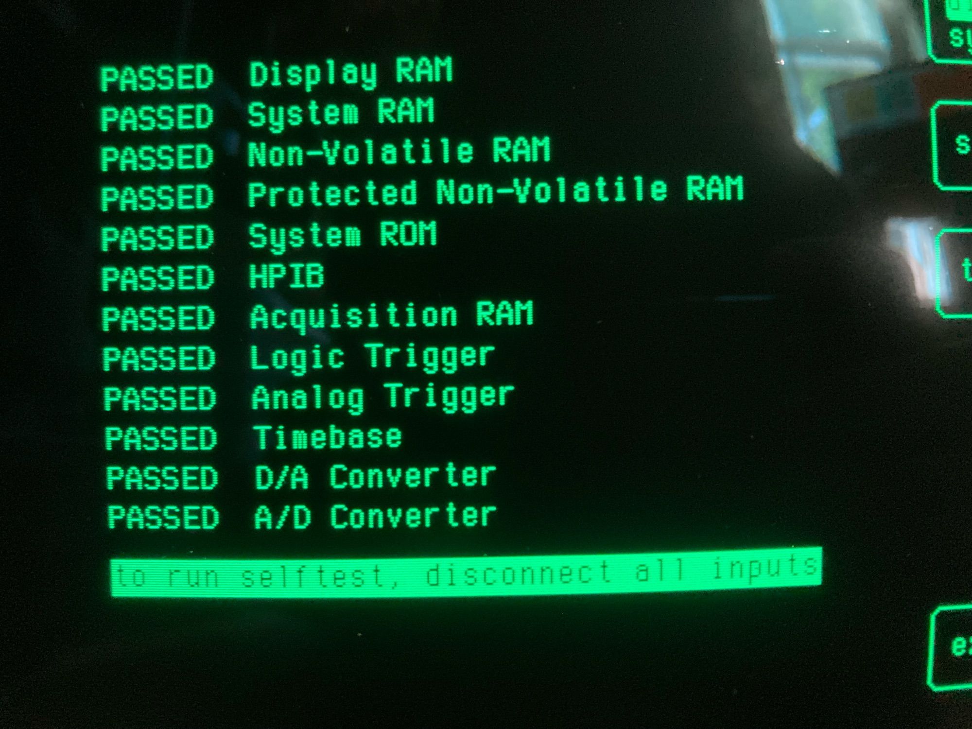 a photo of the CRT on an early 1990's HP 54504A oscilloscope showing all self tests passed