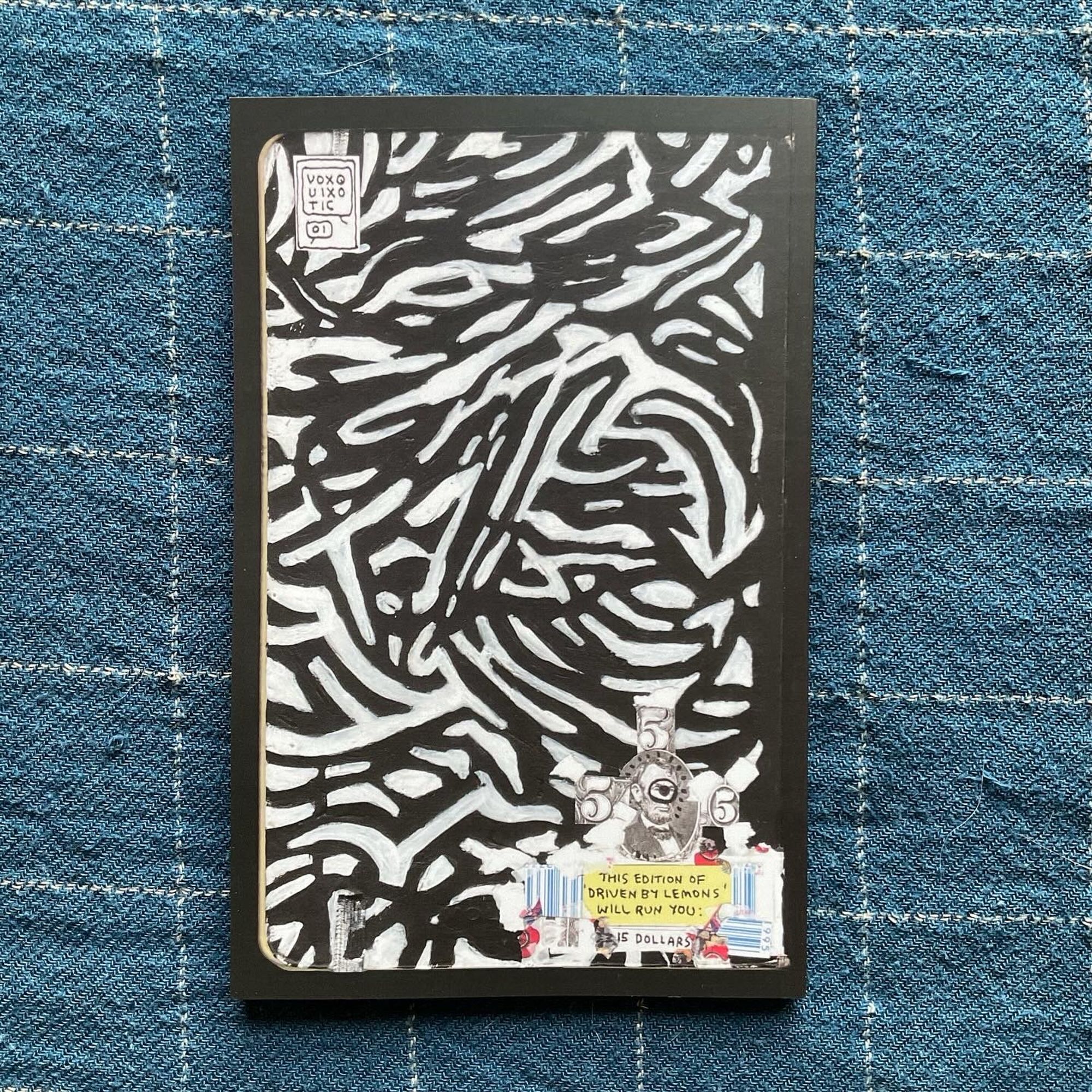 The cover for Driven by Lemons, a black and white abstract painting.