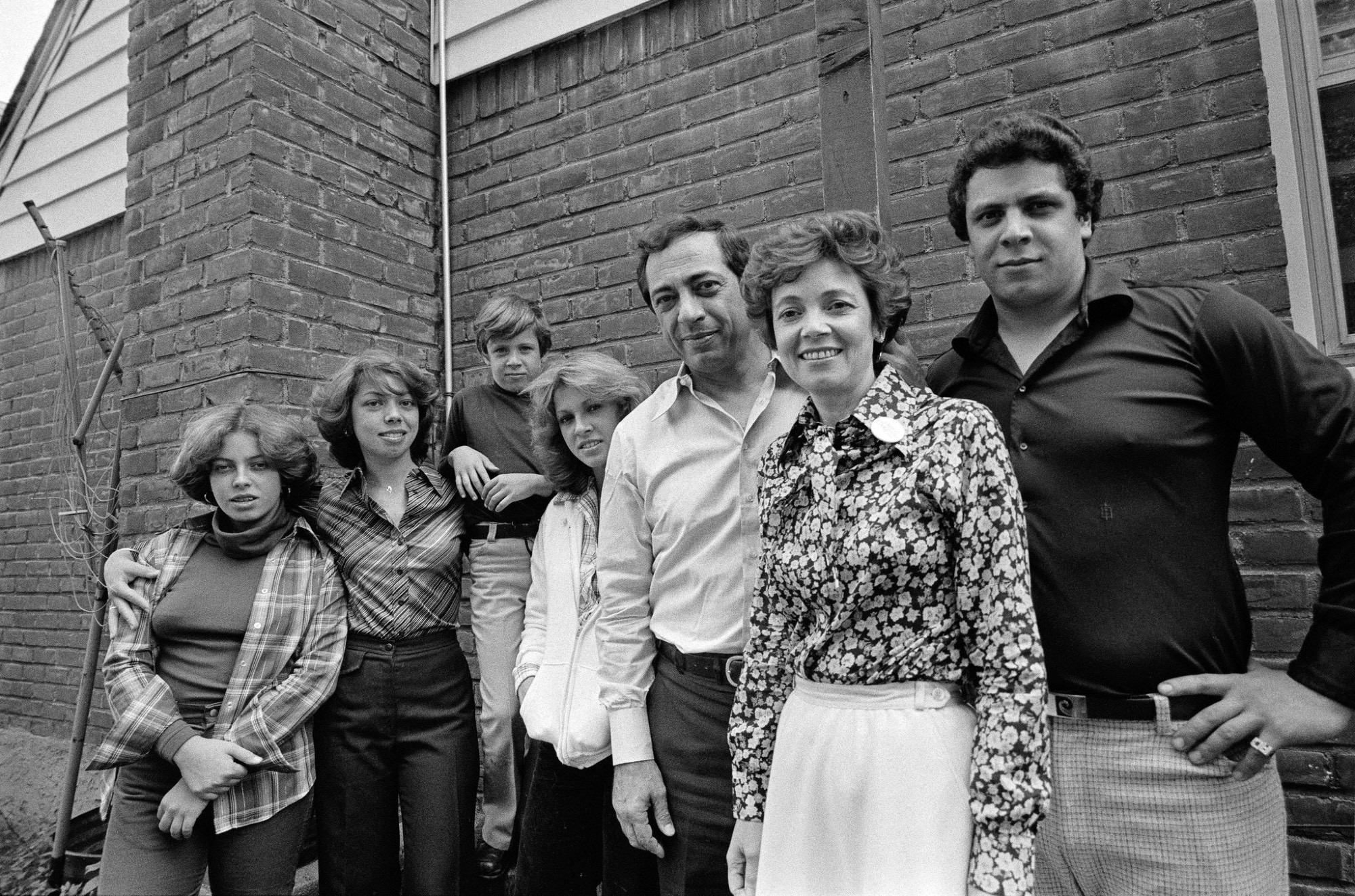 It's an old photo of the Cuomo family with Andrew Cuomo in the foreground with his Neanderthal brow looking like a low IQ mafia thug