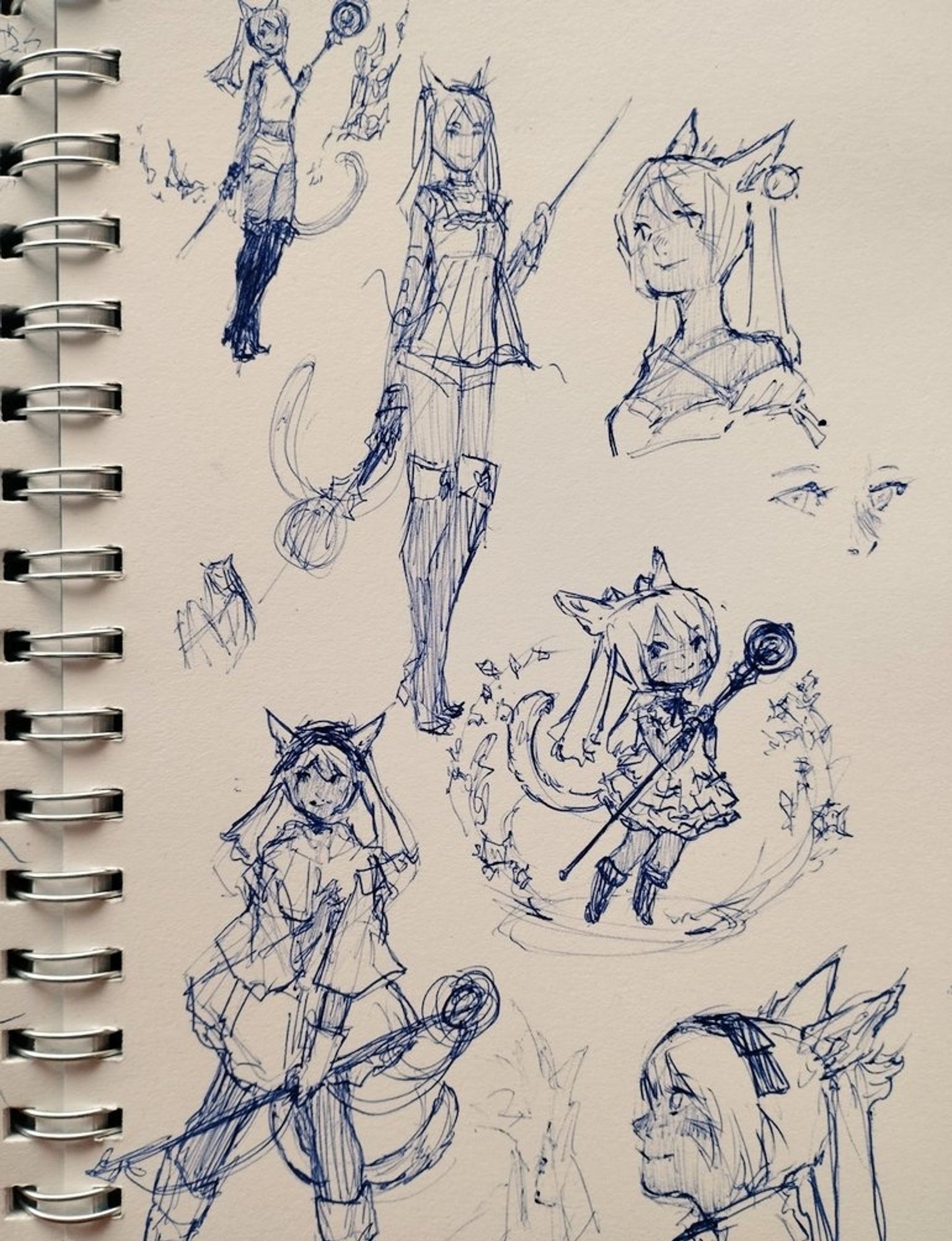 Sletchbook page drawn with blue pen, of my character Khuja in different poses, chibis and bust sketches with her black mage staff and cute appearance

Página de mi libreta de dibujo con bocetos de Khuja hechos con boli azul, en diferentes poses, bustos y chibis, con su staff de maga negra y apariencia cuqui