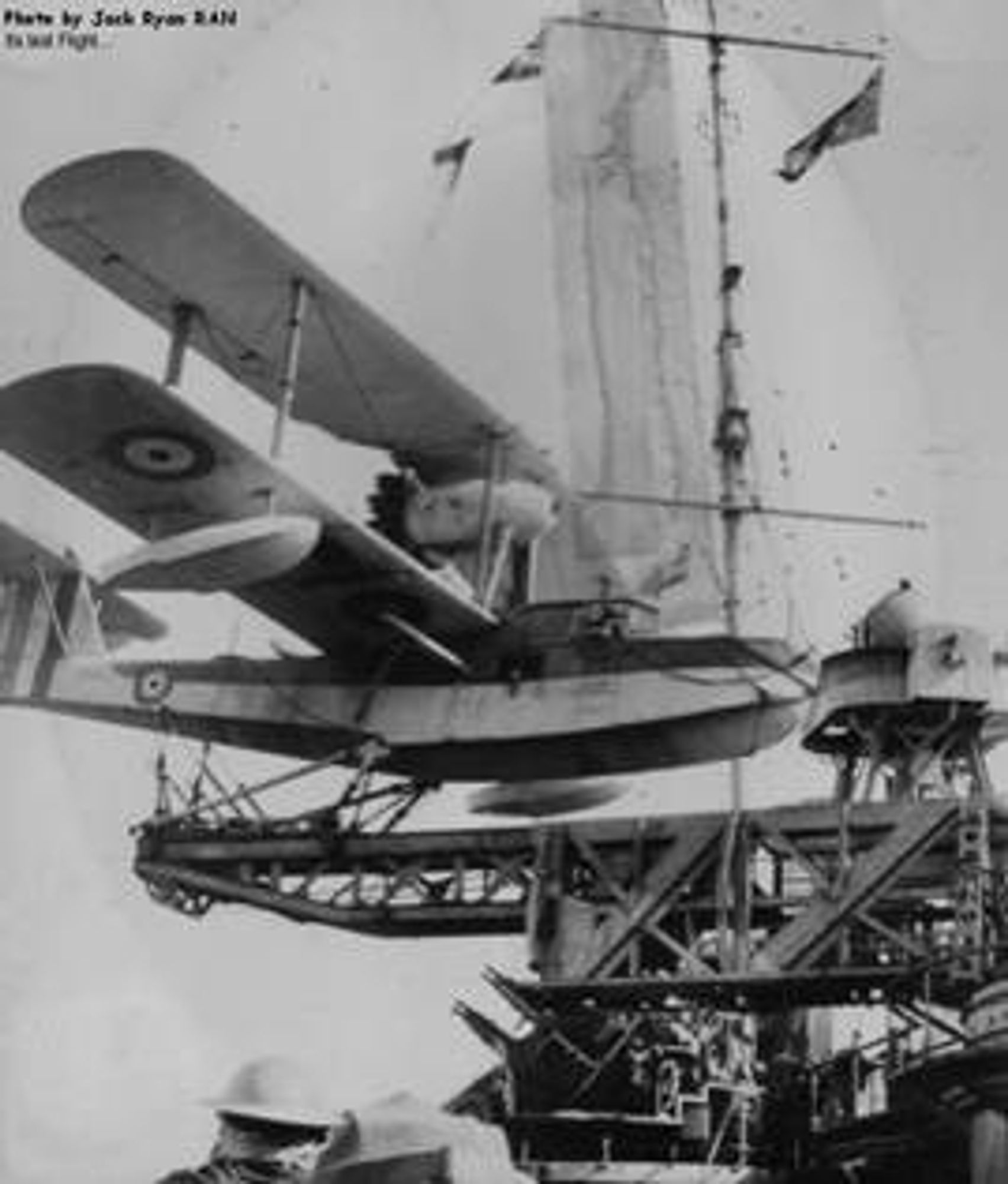 A RAAF Walrus similar to that flown by F/Lt Clarke on the HMAS Australia, ready for a catapault launch. 
https://vwma.org.au/explore/people/623349