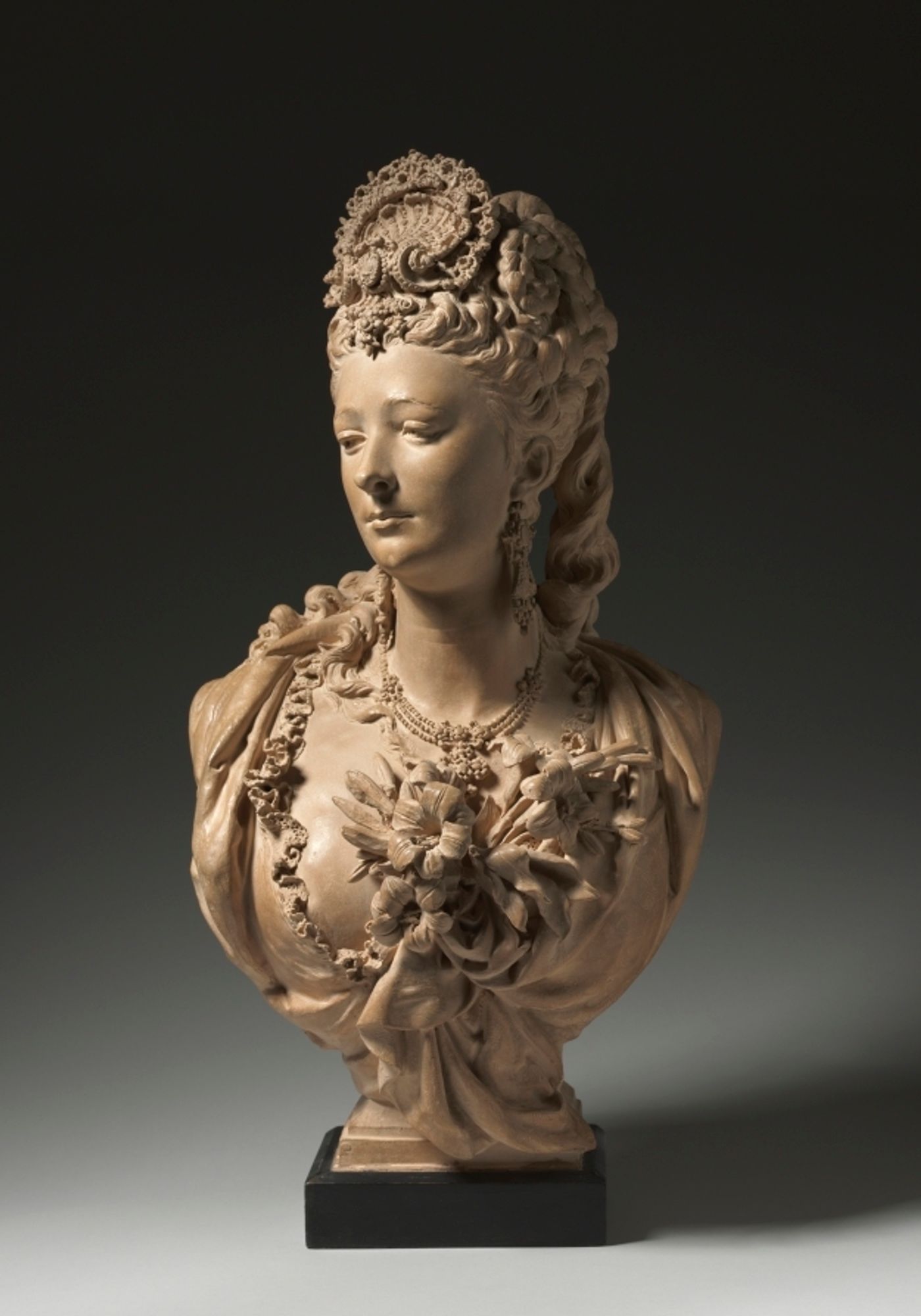 Among the artists who reacted against the static poses of neoclassical art, Carrier-Belleuse drew inspiration from the opulence and excess of Rococo portraiture of the 1700s. This bust resembles one of Napoleon III's mistresses, Marguerite Bellanger, whose features the artist is known to have borrowed for his female busts. Carrier-Belleuse received commissions from Napoleon III, ruler of France from 1852 to 1870, and contributed to the sculptural decorations of the Louvre and Opera Garnier in Paris.