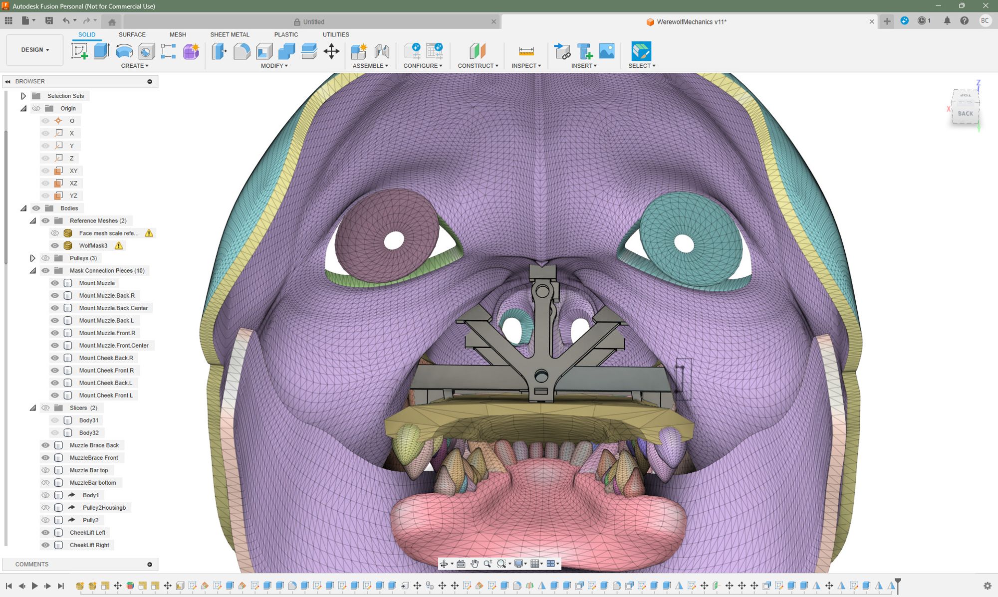 God-forsaken screenshot from Fusion 360. Technically, it's the inside of the werewolf mask with some of the mechanisms displayed. It is possible to make out some features such as eyes, teeth, and nostrils. It looks terrifying and leaves the viewer with a haunted, empty feeling in their soul.