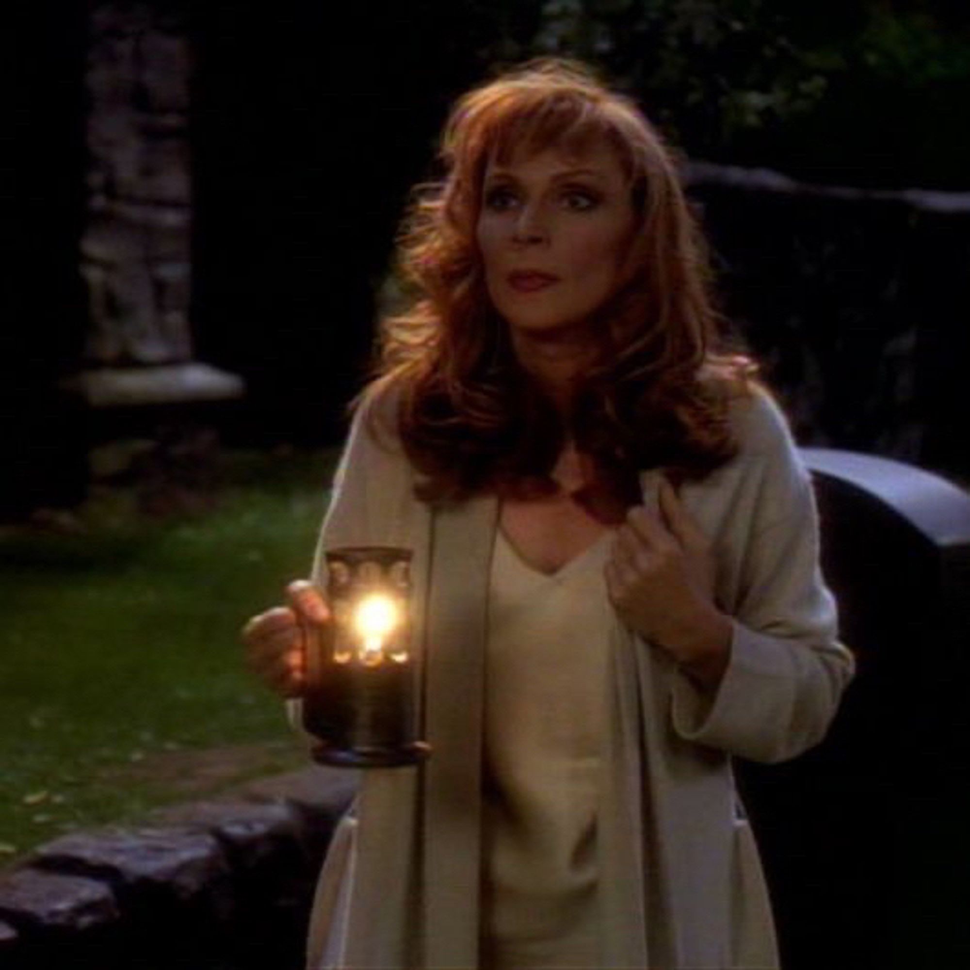 dr crusher walks thru a cemetery with her haunted candle in the next generation episode “sub rosa”