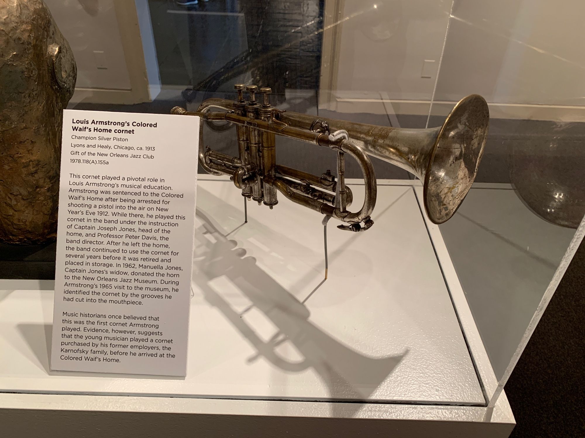 A photo of young Louis Armstrong’s cornet from the Colored Waif’s Home, on display at the New Orleans Jazz Museum