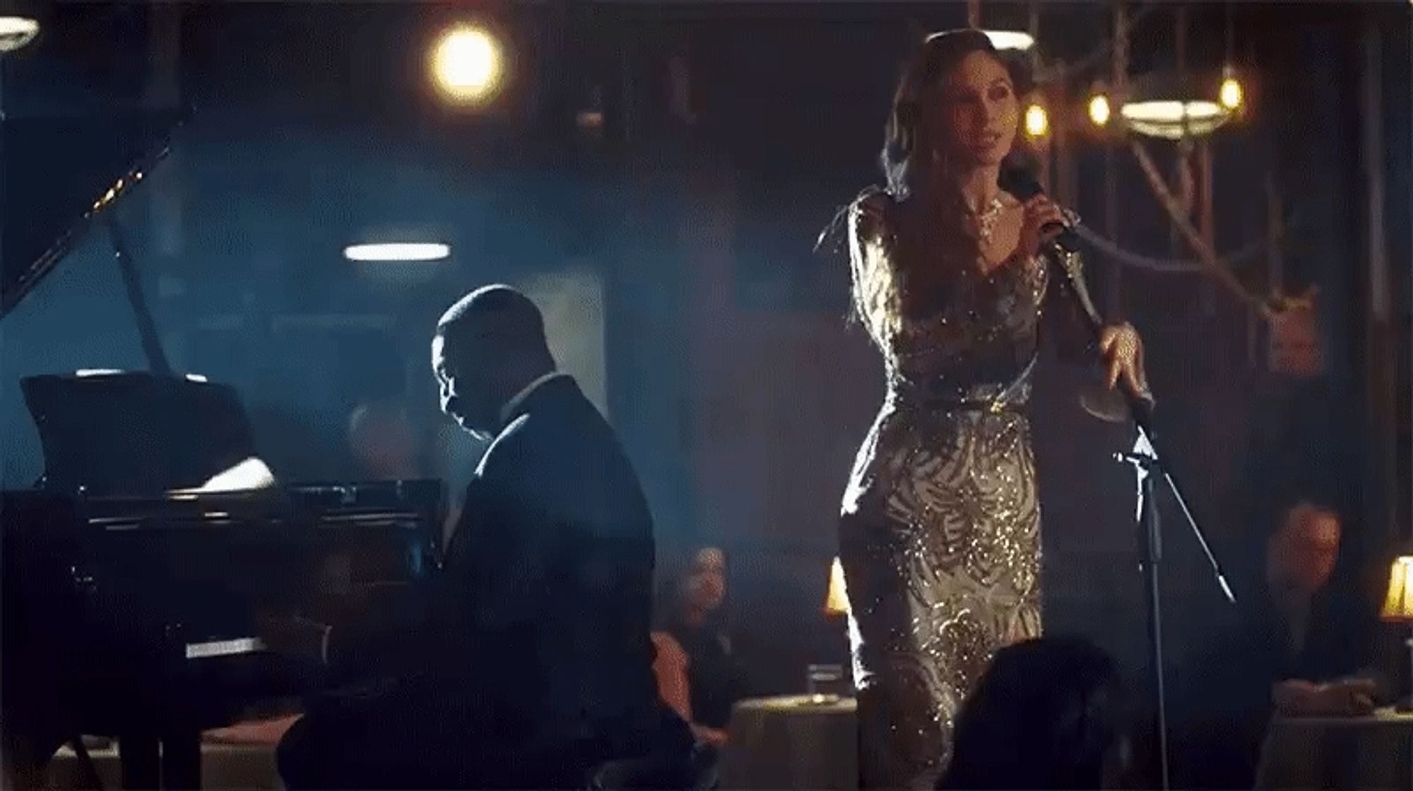 Waverly singing on the Ba-ding Ba-ding stage in her shiny dress