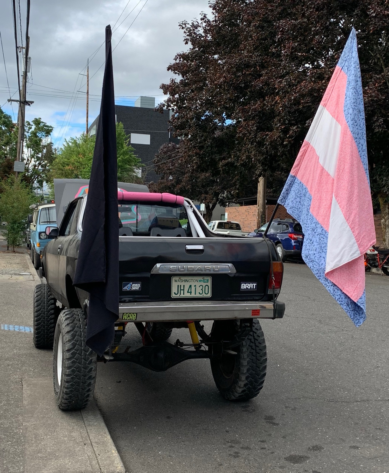 Subaru brat with a black and trans flag 2