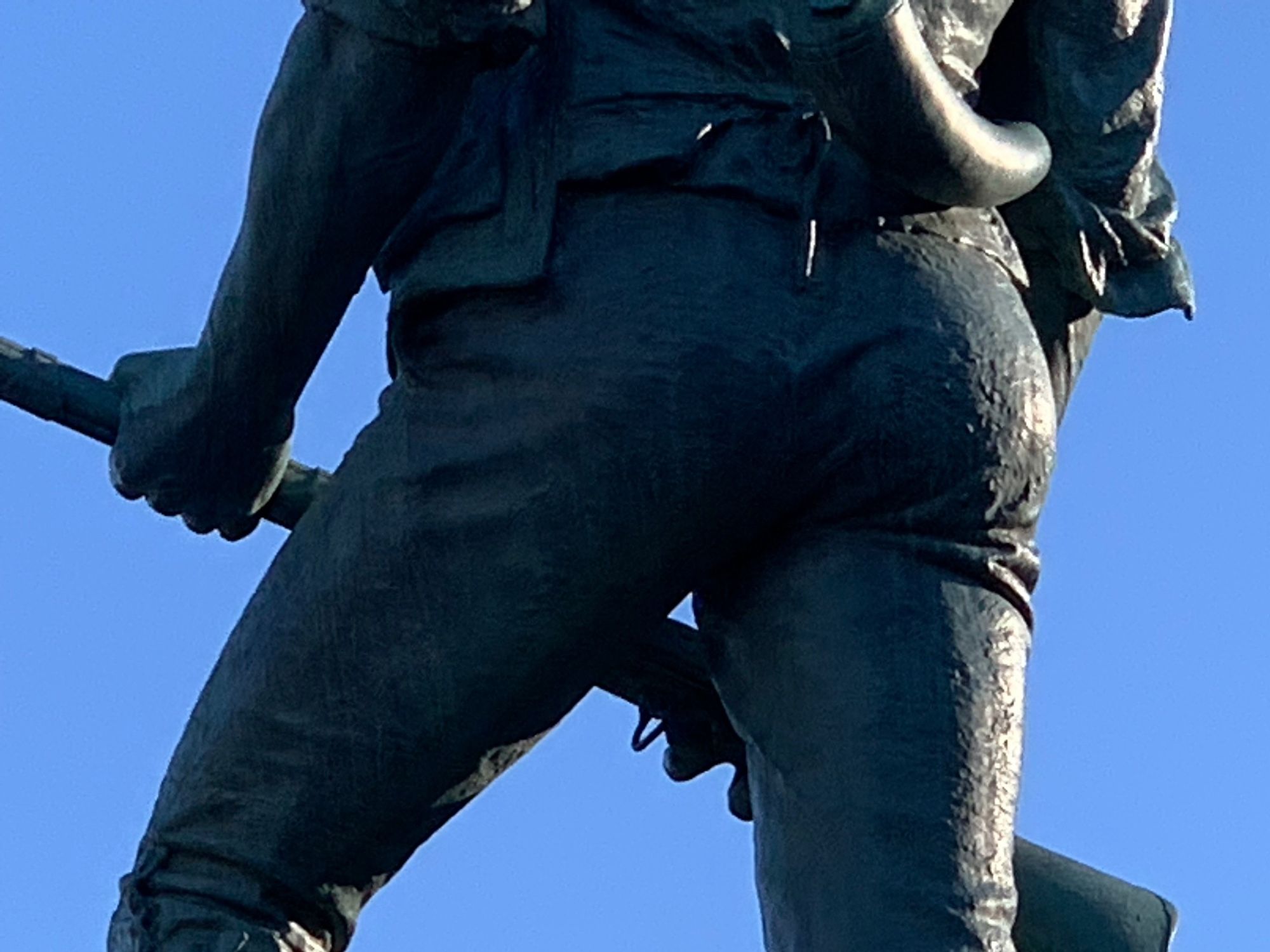 rear view of the statue of revolutionary war minuteman John Parker, who fought in the battle of concord  - enhance to butt 