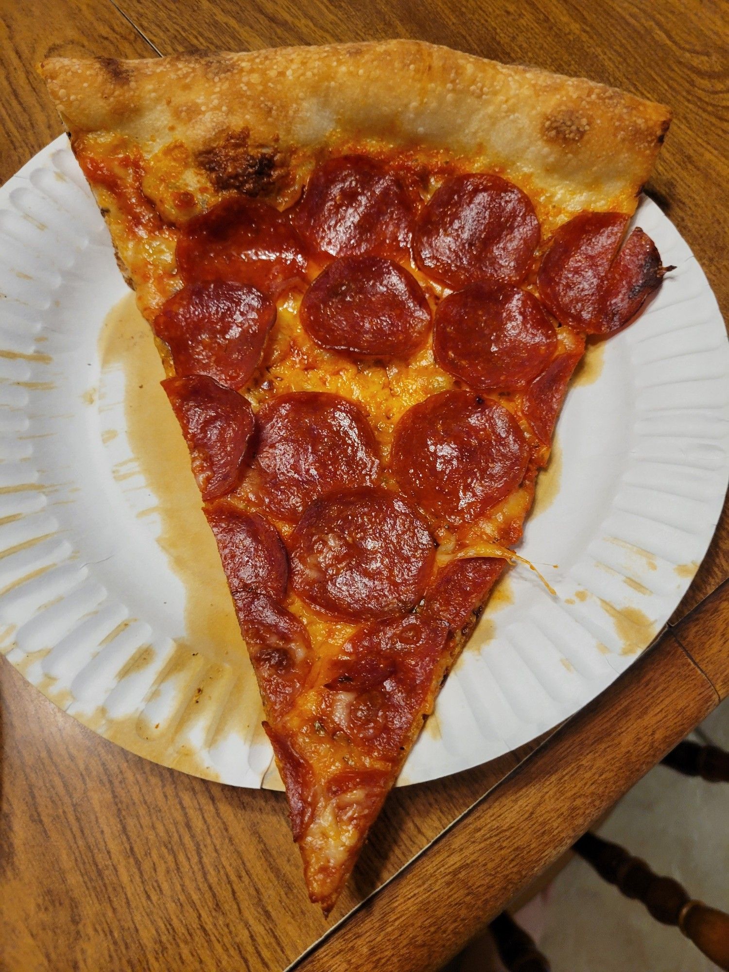 Pepperoni pizza slice.