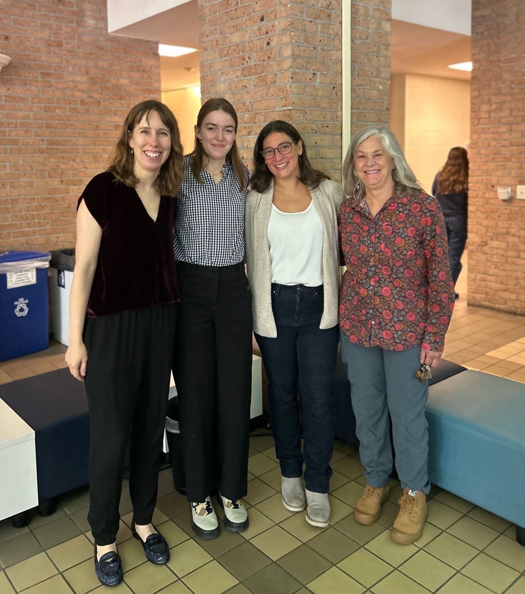 Emily Ray with dissertation committee members Christine Lattin, Patricia Schneider, and Evanna Gleason.