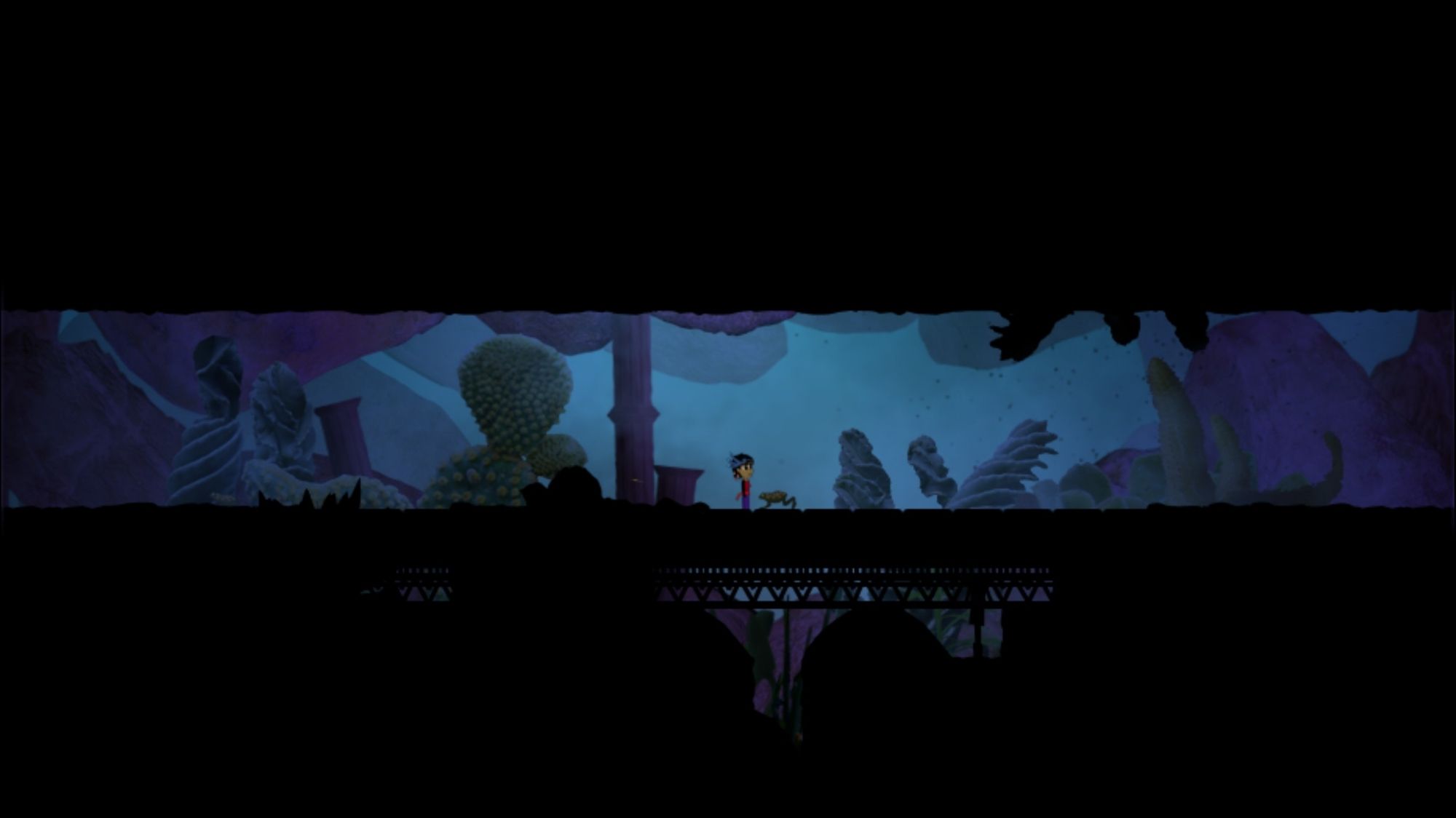 A screenshot of a 2d game with a tiny character next to a frog (mid hop) half her height in the middle of the screen. The scene is tinted a shadowy cobalt blue and appears like a damp cave-like corridor, stretching straight across the screen from left to right with pitch black above and below. Various formations appear somewhat at random in the background. The character and frog are standing on a section of floor that appears to be supported by trestle across a hollow spot beneath it. The mood of the scene is lonely and dim but still thriving.