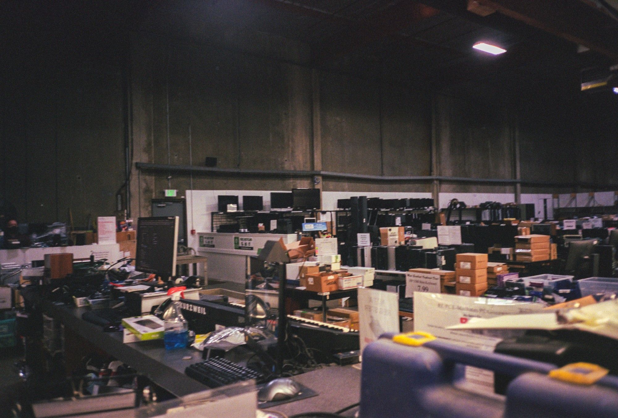 A photo looking across a large miscellaneous variety of equipment at Tukwila REPC, including monitors, computers and more