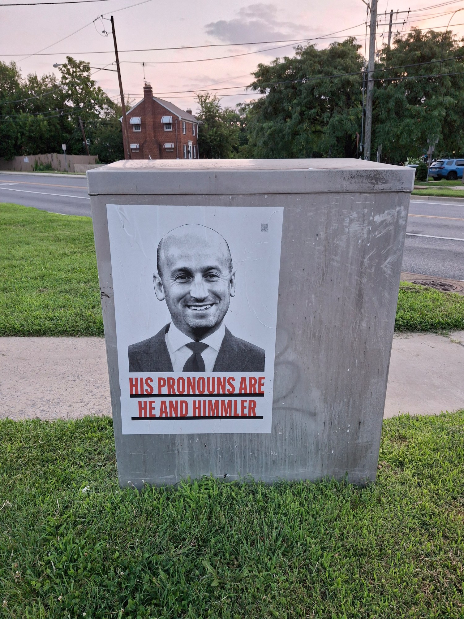 Poster with a photo of Stephen Miller, Architect of Evil, that reads: His pronouns are he and Himmler