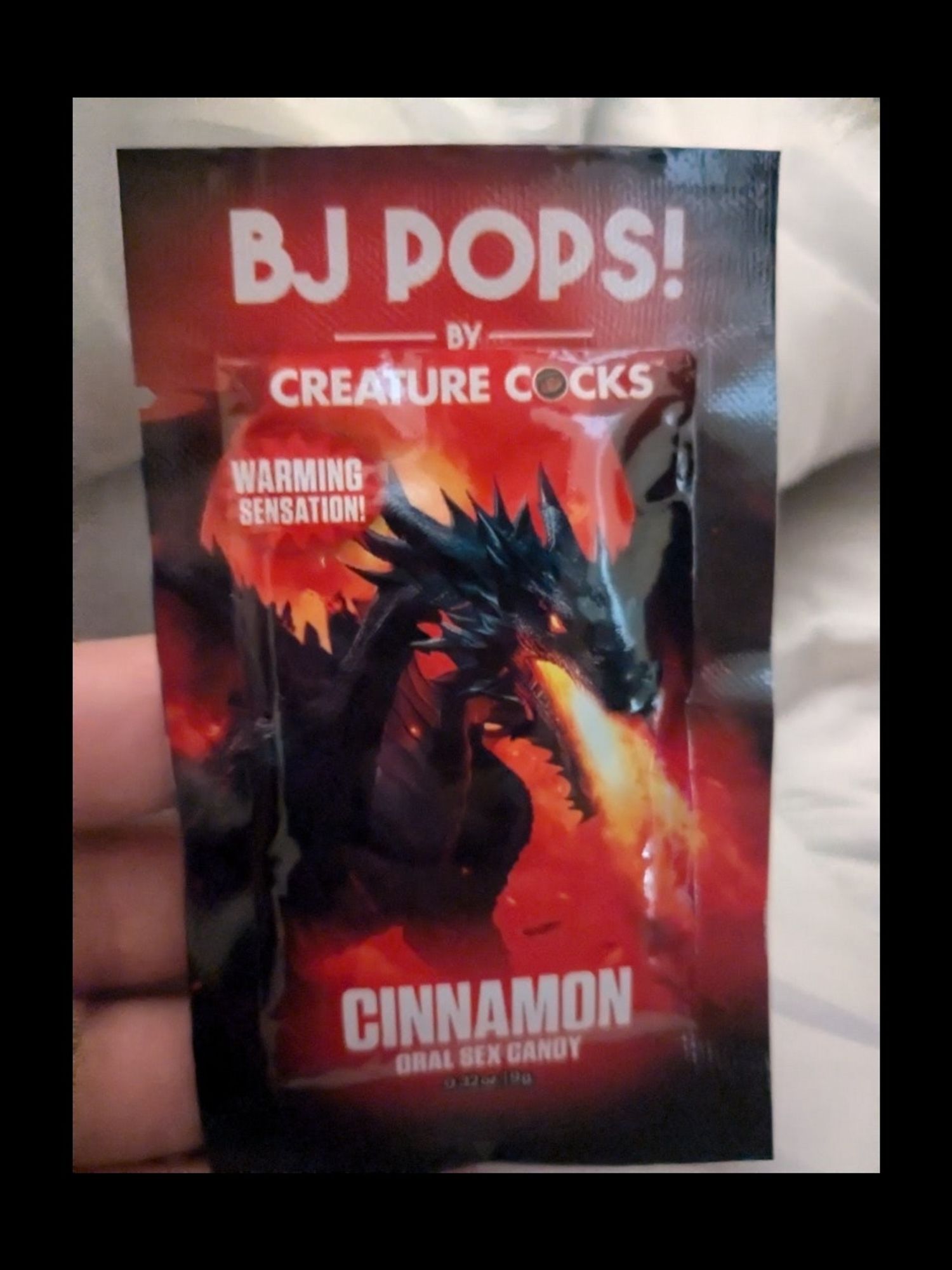 "BJ pops" by apparently real company name "creature cocks" (featuring "warming sensation!") — a little pack of what appears to be cinnamon flavour popping candy marketed especially to sex nerds