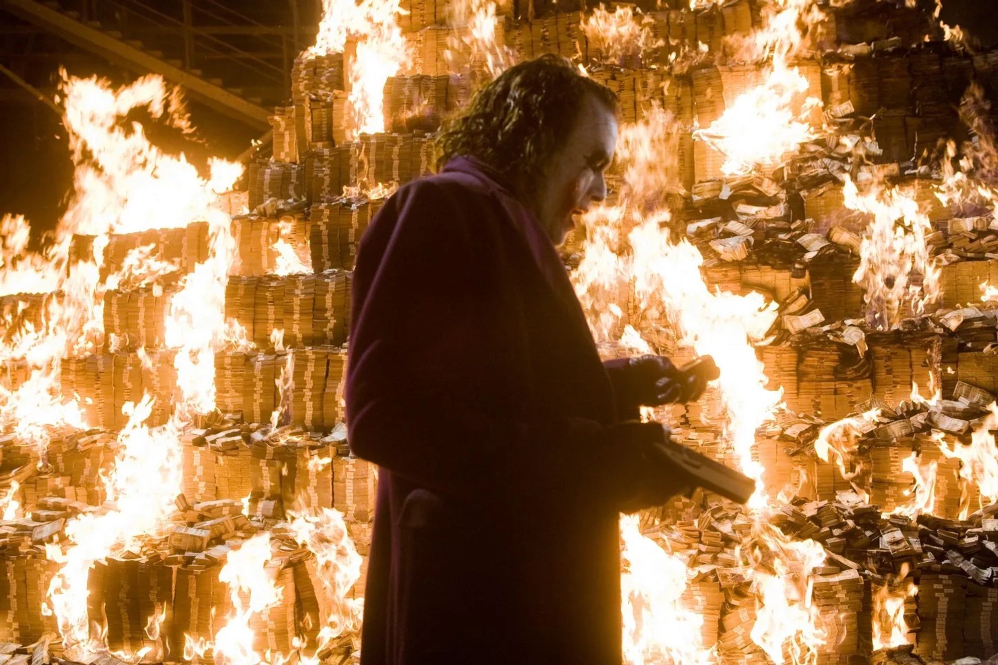 Heath Ledger’s Joker setting fire to an enormous mountain of money