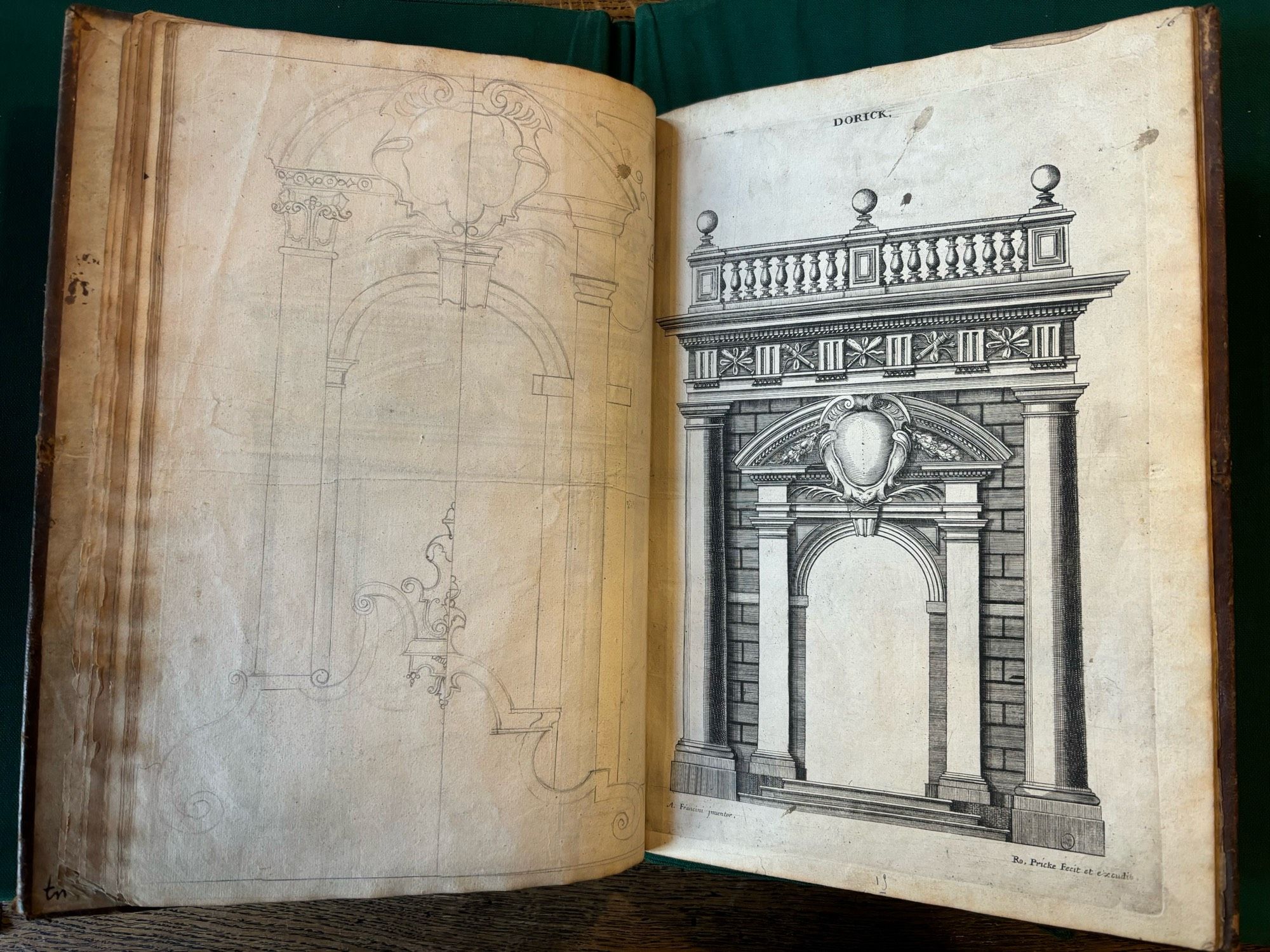 A new book of Architecture by Francine, opened to show a plate of arch design, and a doodled arch on a verso - the book has been used as a copy book, as it should be!