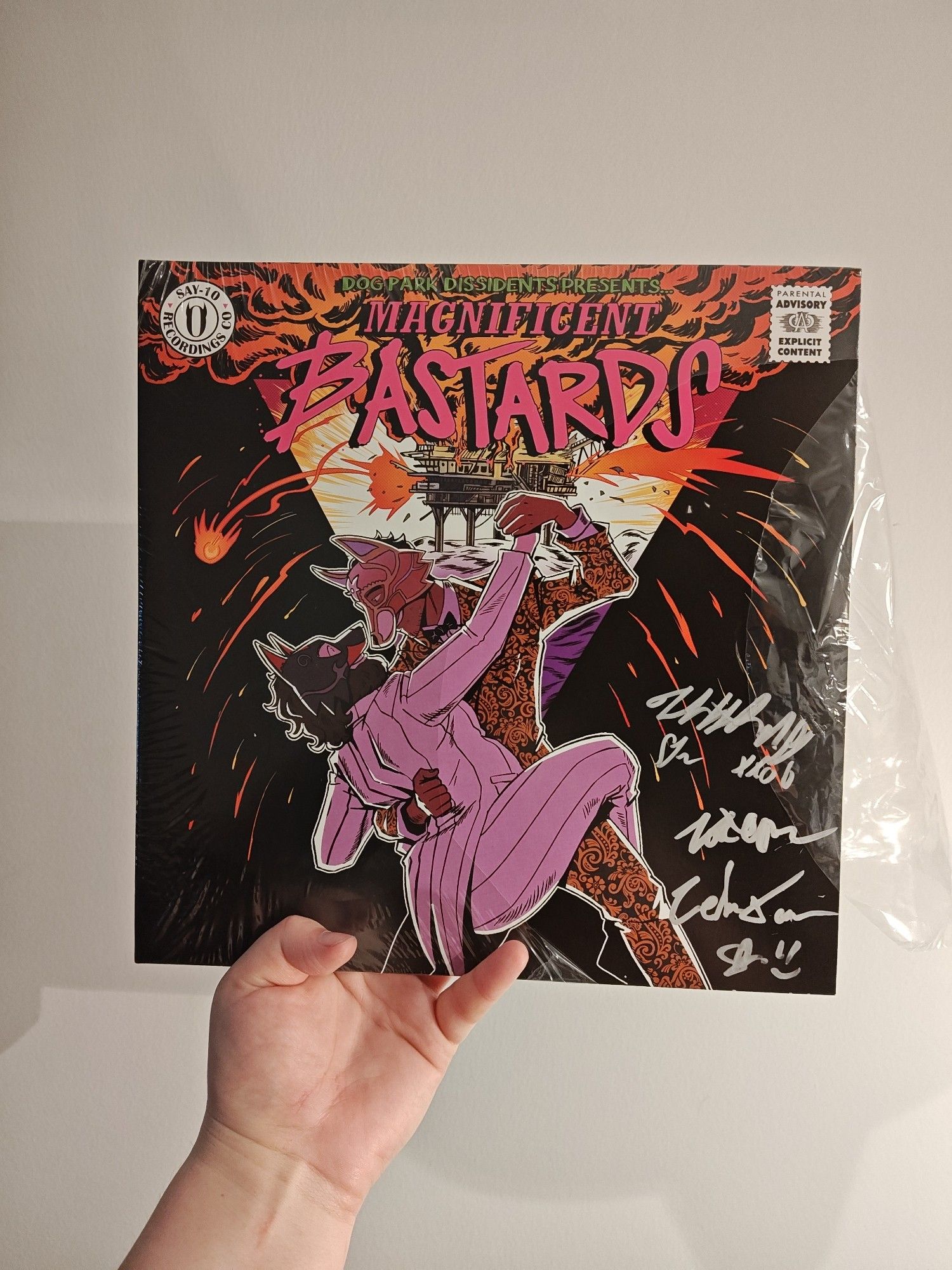 A copy of the Dog Park Dissidents "Magnificent Bastards" signed by several of the performers