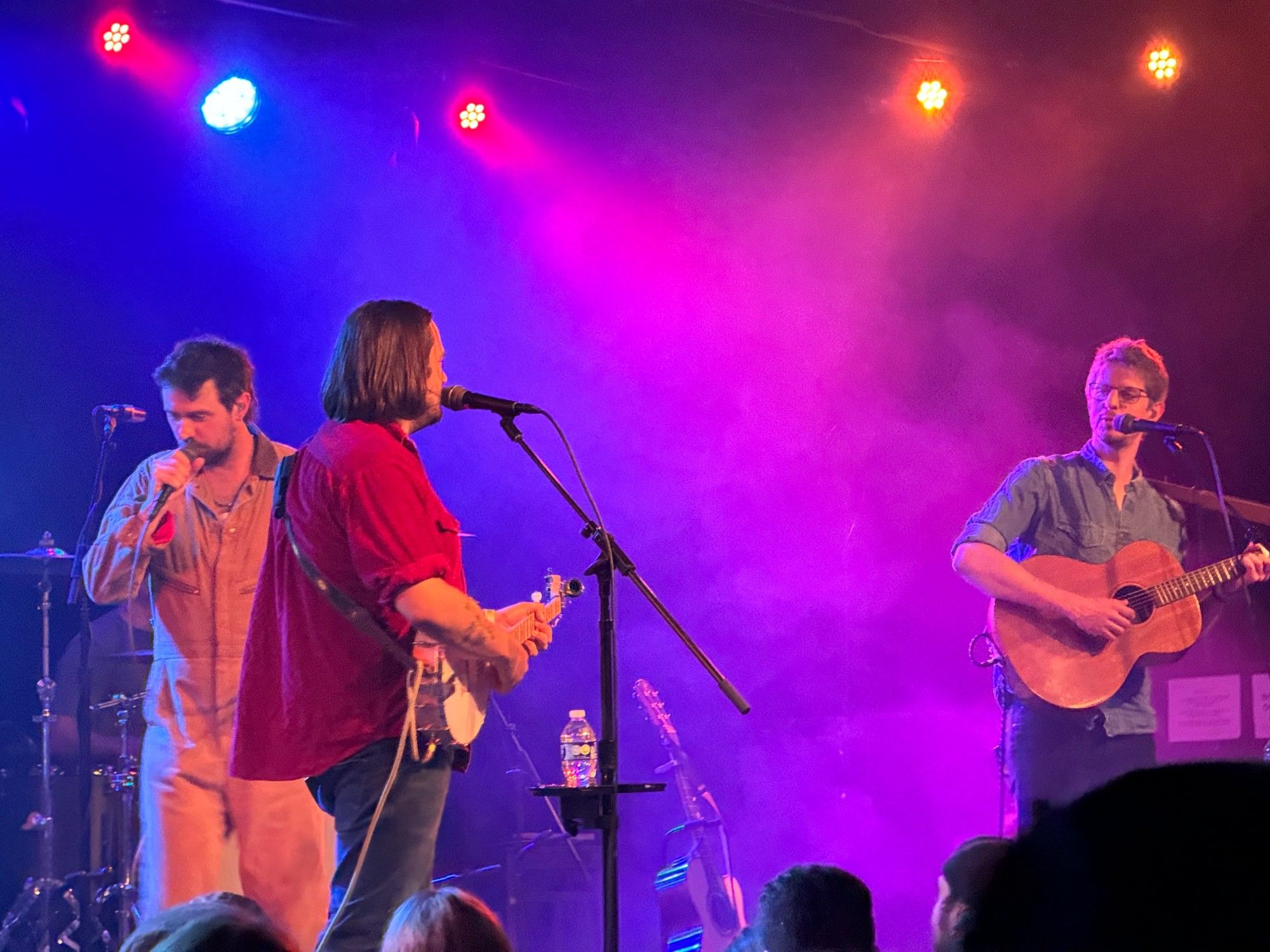 Another image of The Longest Johns on stage in Seattle, zoomed in a little bit to focus on the three members of the band, Robbie Sattin, 	Andy Yates, and Jonathan "JD" Darley (from left to right).