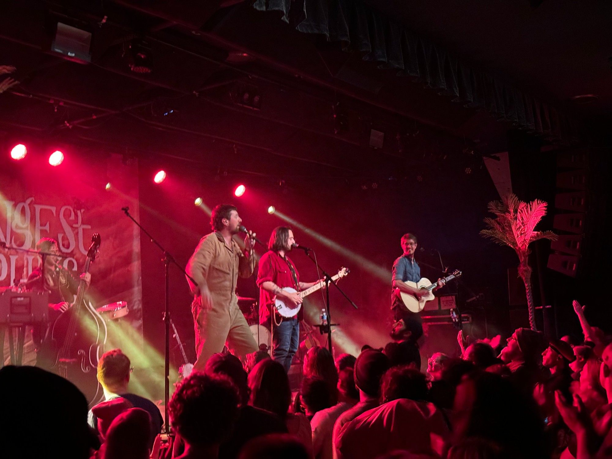 Another image of The Longest Johns on stage in Seattle, this time playing an encore and performing Retirement Song as their final song of the show.