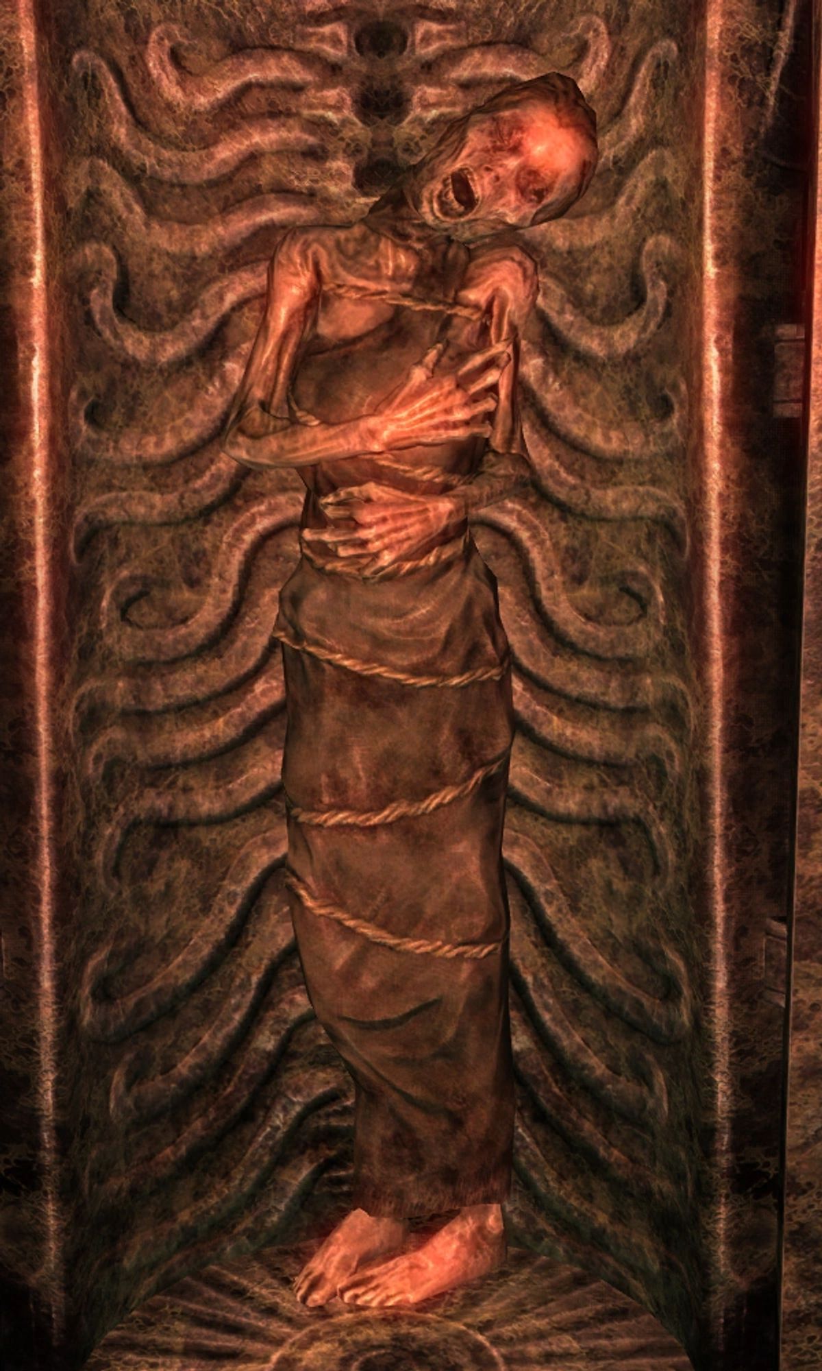 An image of the Night Mother from Skyrim as a mummified corpse leaned upright in her coffin, her skull-like head hanging to the side, mouth agape