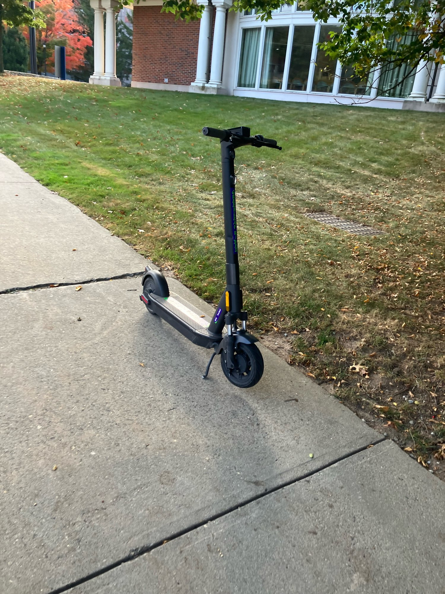 Scooter in the middle of a walkway