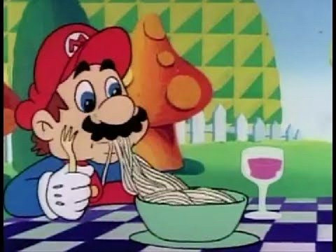 mario brothers cartoon. mario is slurping down spaghetti with, apparently, no sauce. also has a nice glass of wine next to him that is a real odd light purple color