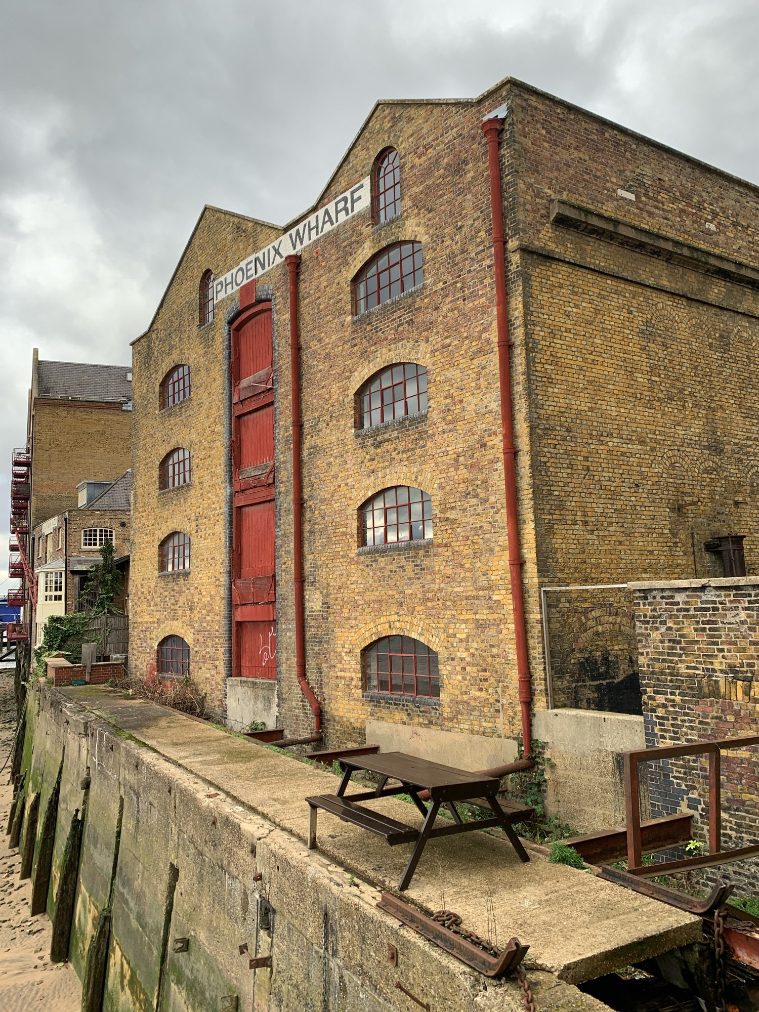 Table on riverside terrace at Phoenix Wharf, Wapping.