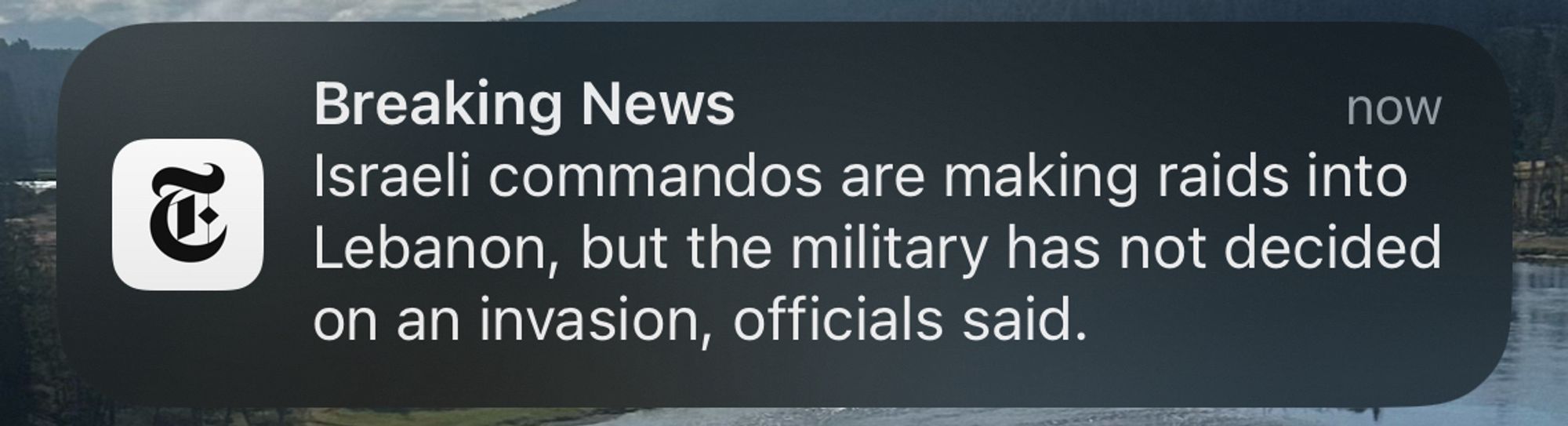 A news alert that says Israeli troops are "making raids into Lebanon" but also that isn't an invasion