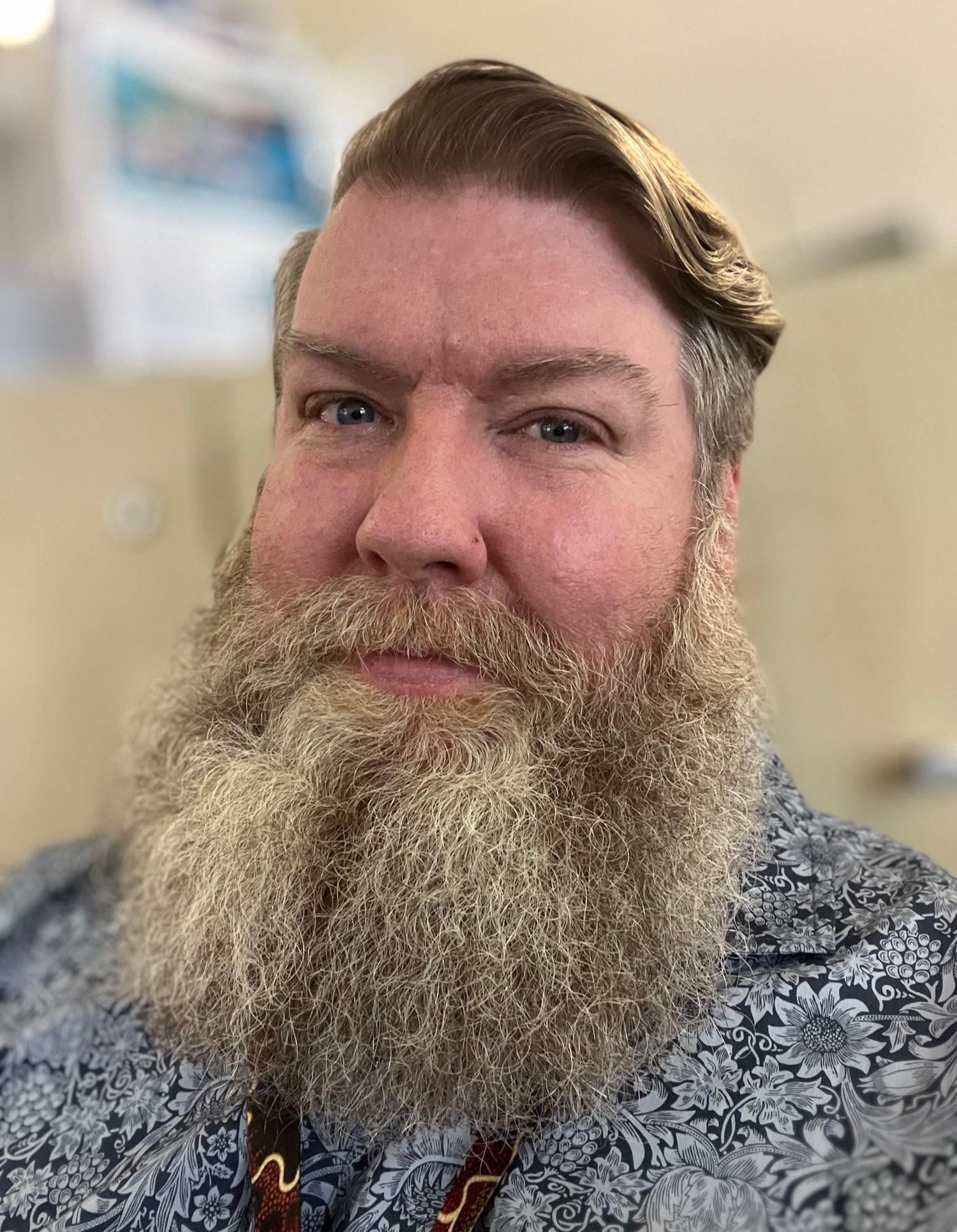 The account holder — white, bearded and 47 — avoiding work in the office