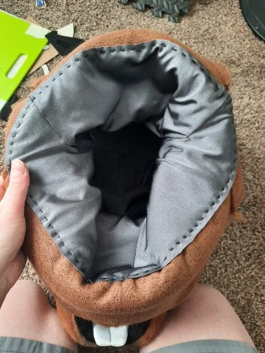 Photo of the inside of the fursuit head. This pic mostly shows the neck lining sewn to the fur of the neck.