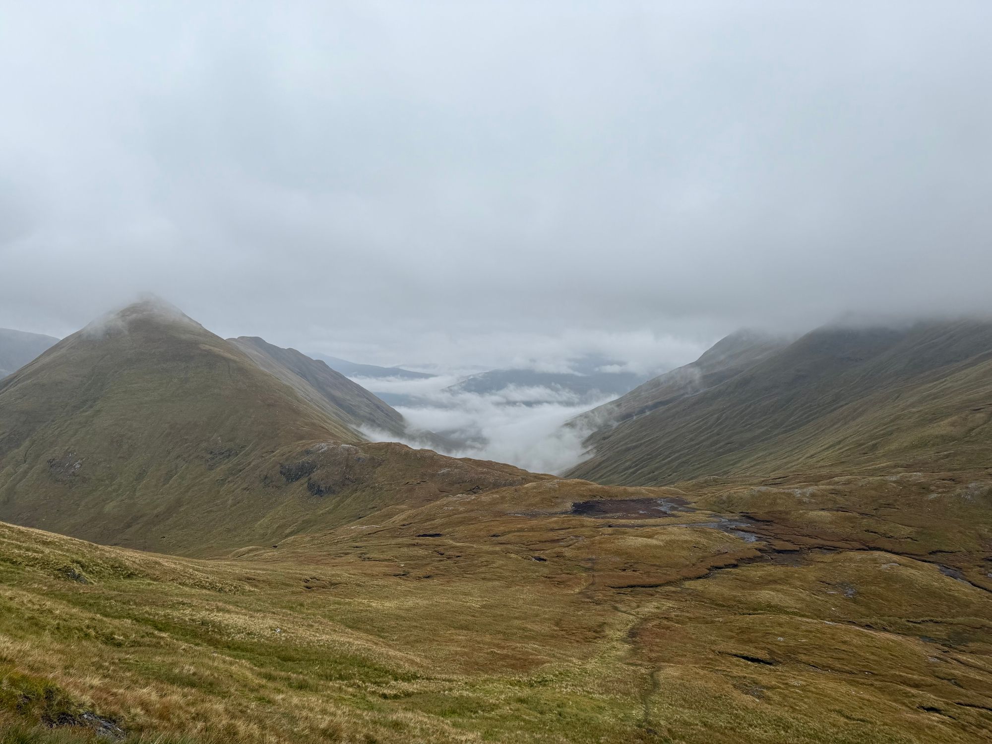 View down to Cluanie with Am Bàthach on the left and a boggy bealach ahead