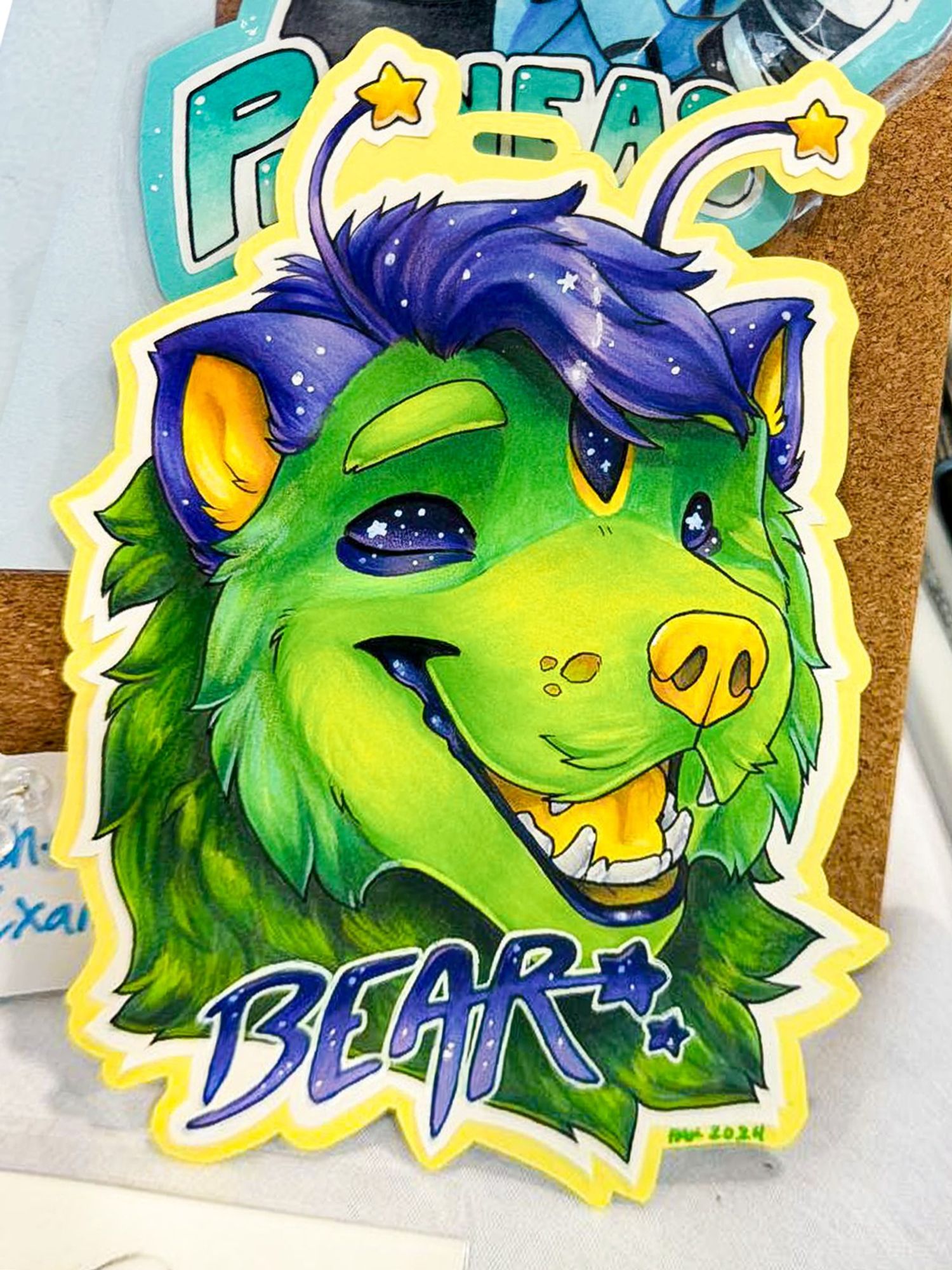 a traditional drawing of a bright green alien bear character