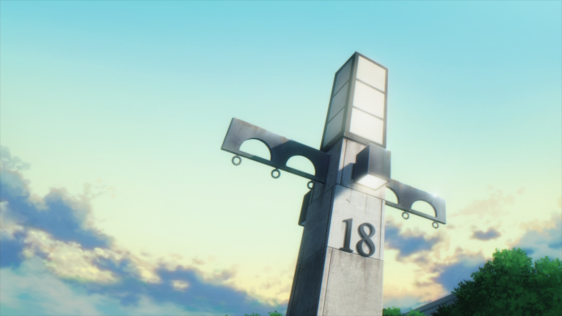 A shot of the early morning sky and a large building sign