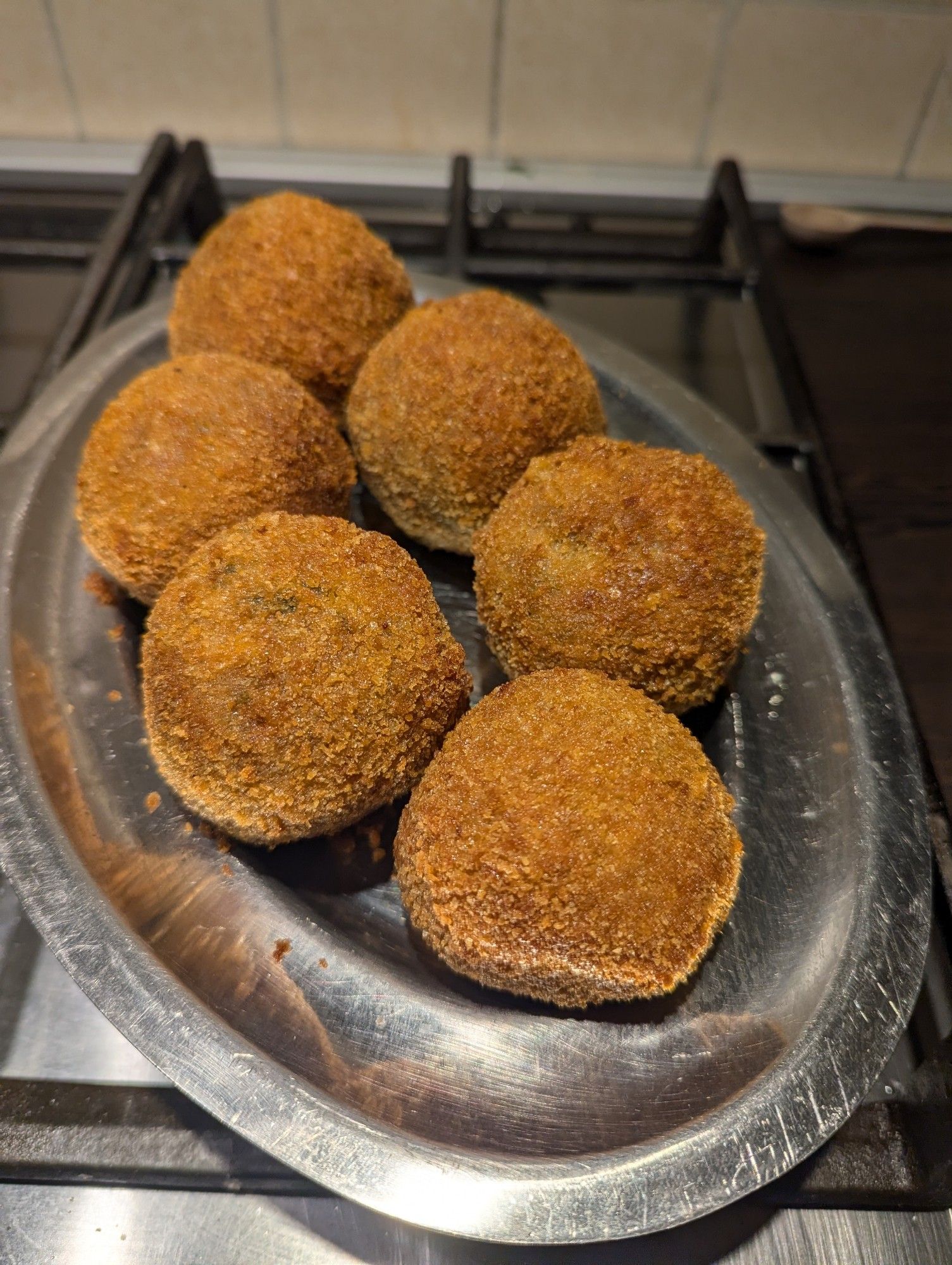 Rice arancini with boar, porchini mashrooms and gouda