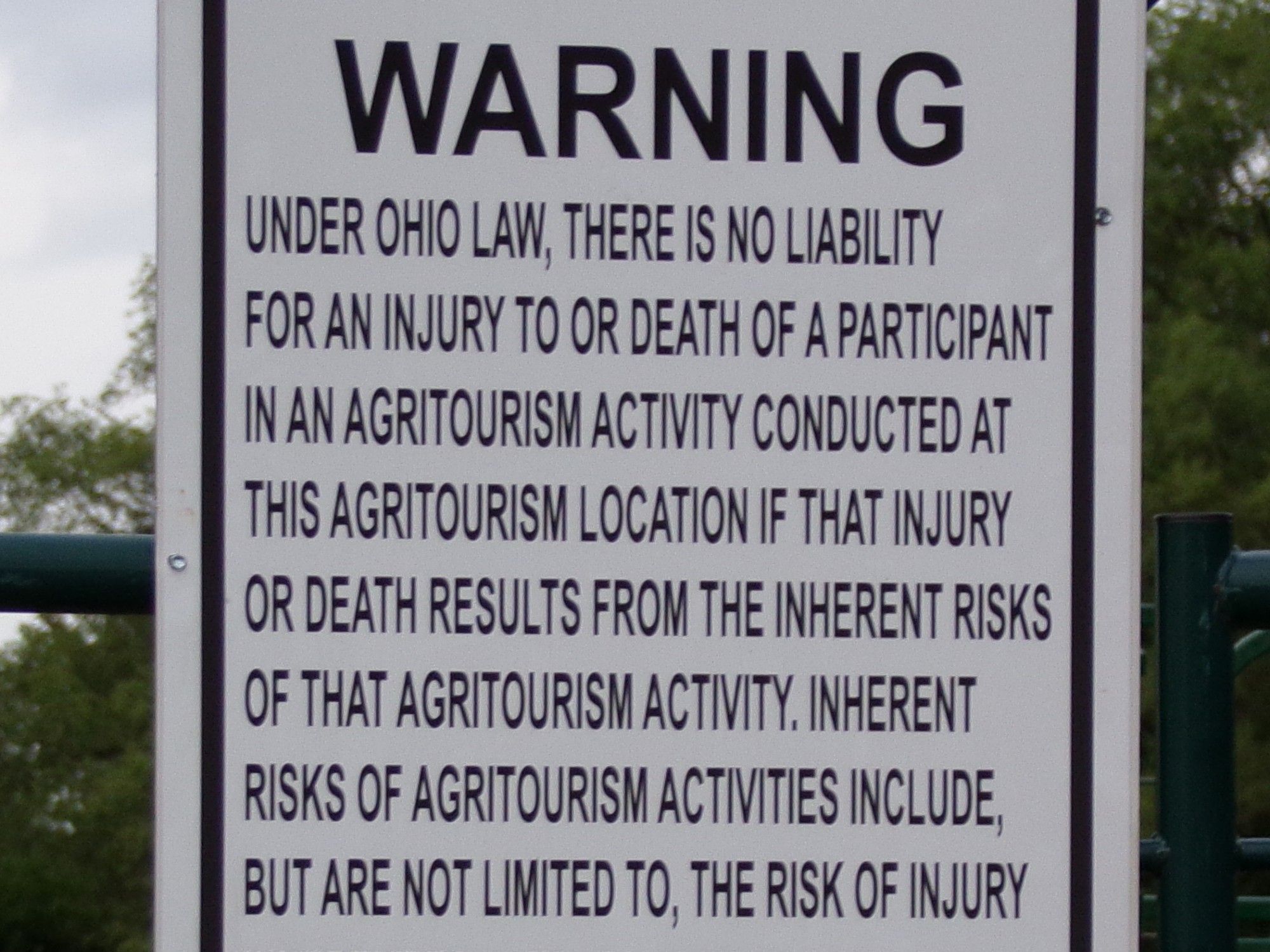 SIGN - WARNING, under Ohio law there is no liability for an injury or death in an agritourism activity conducted at this agritourism location ...... etc..