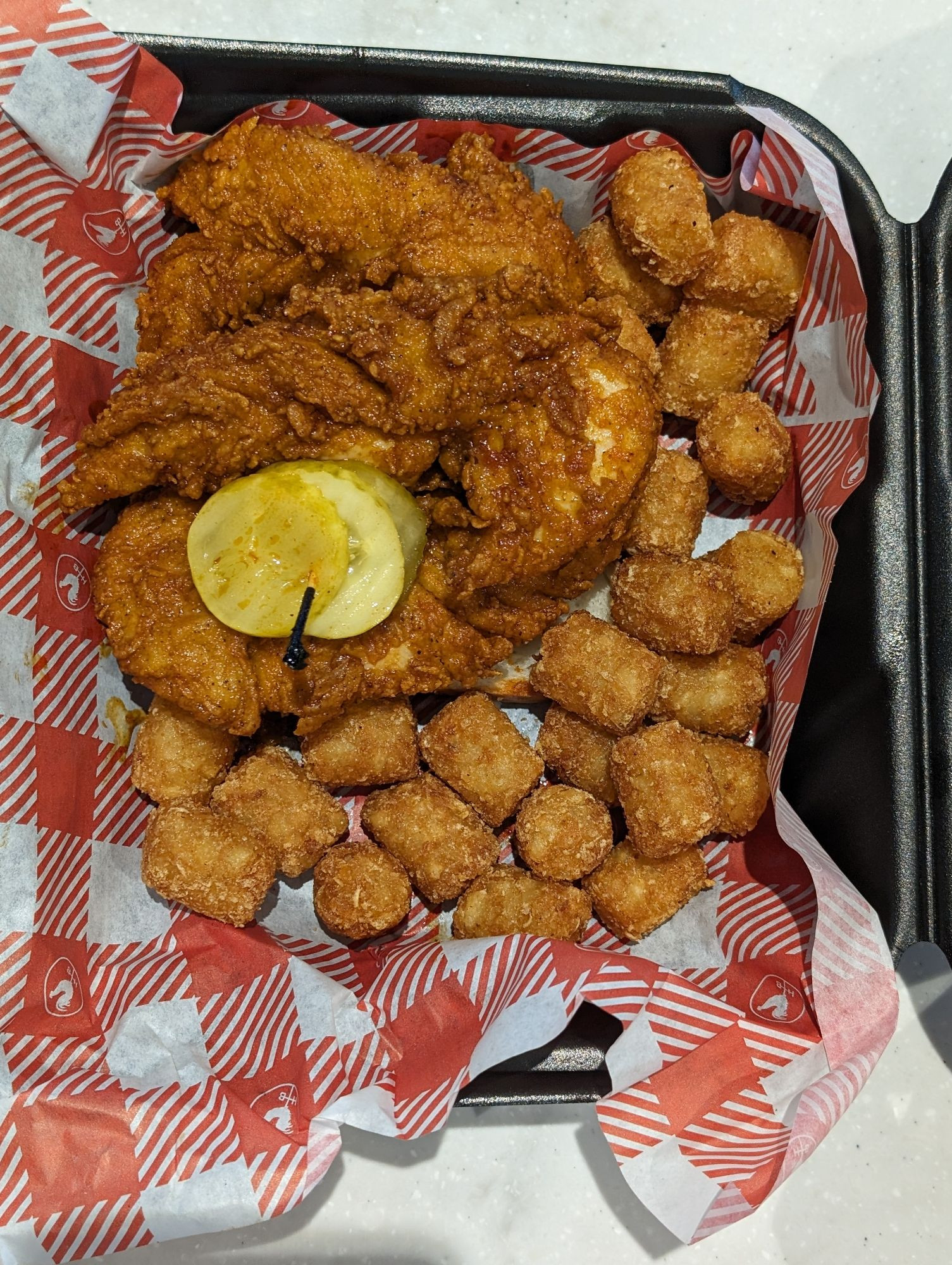 I ordered chicken tenders, because why wrestle with bones. And it came with tater tots!