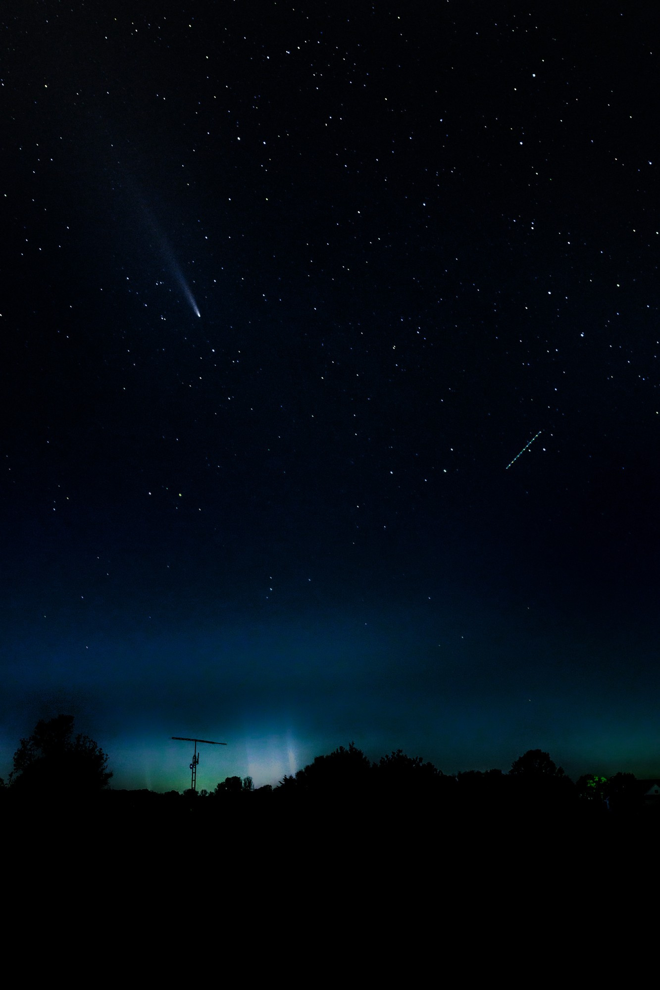 Comet Tsuchinshan-ATLAS, hovering over my neighbor's house. 