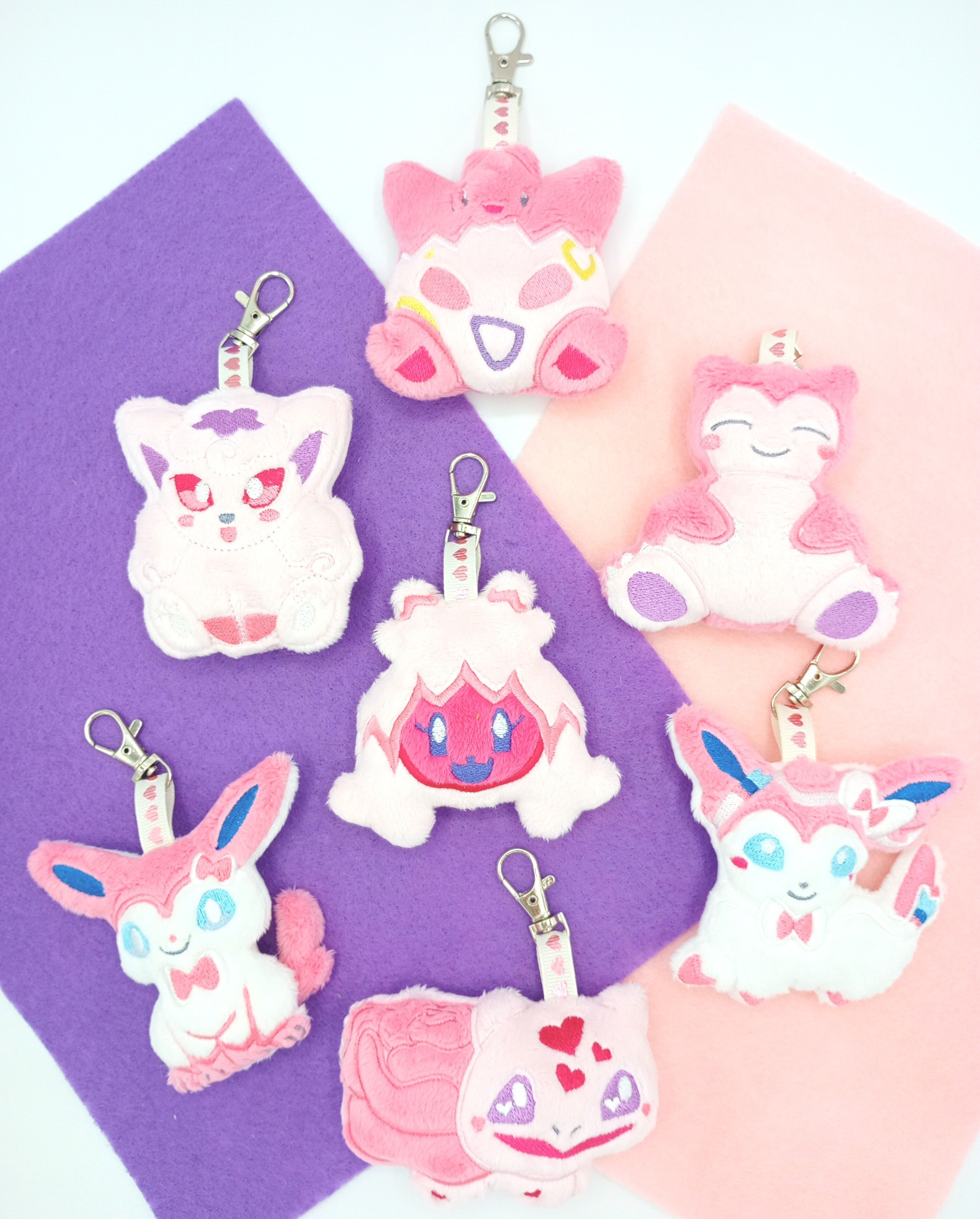 A collection of handmade pink Pokemon plush keychains.