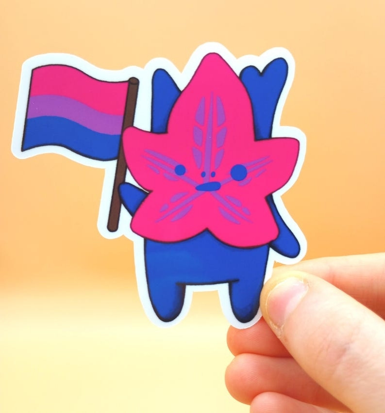 A handmade Bisexual Pride Korok vinyl sticker from the Legend of Zelda.