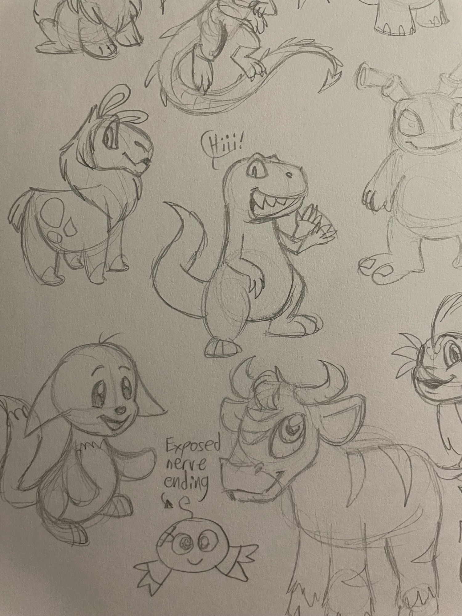 Zoomed in on sketches. Focus on gnorbu, grarrl, kacheek, kiko, and kau. The grarrl has a thought bubble saying “hiiiii!” The kiko has an arrow pointing to it’s hair that says “exposed nerve ending”