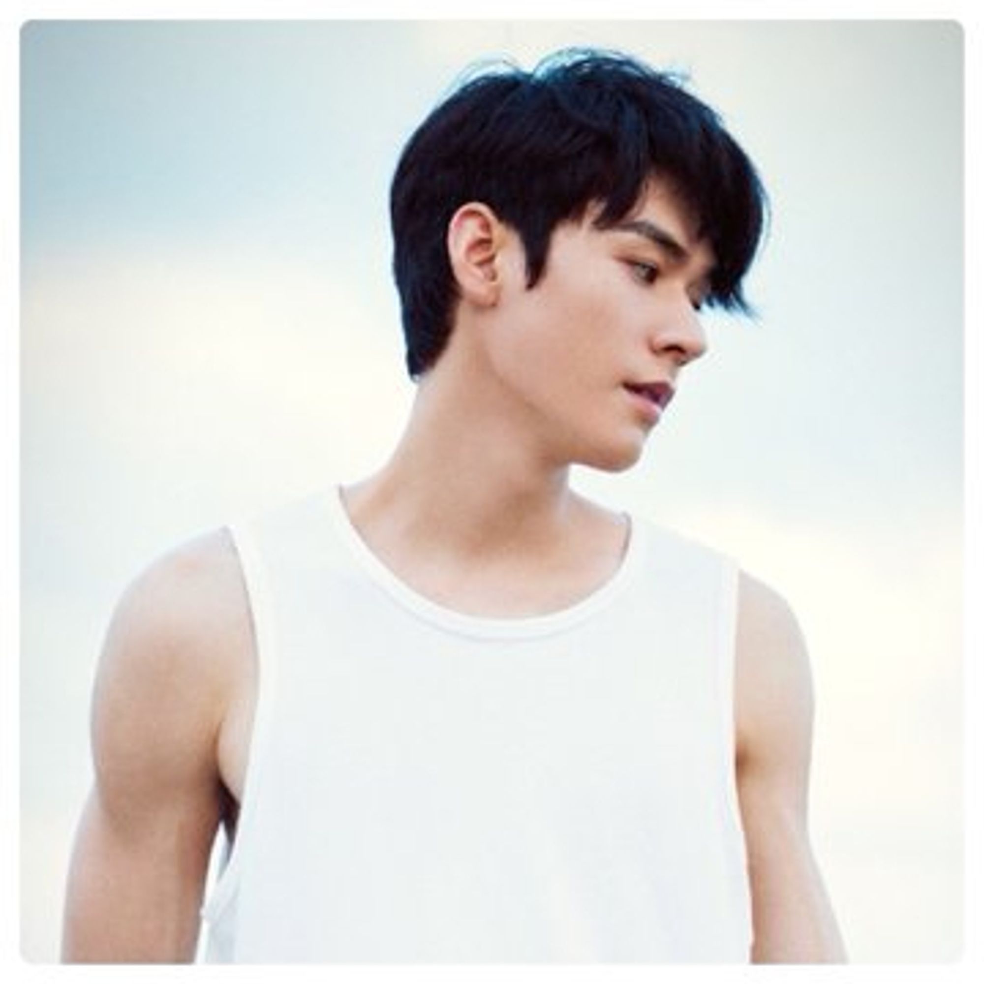 Gong Jun in a white tank